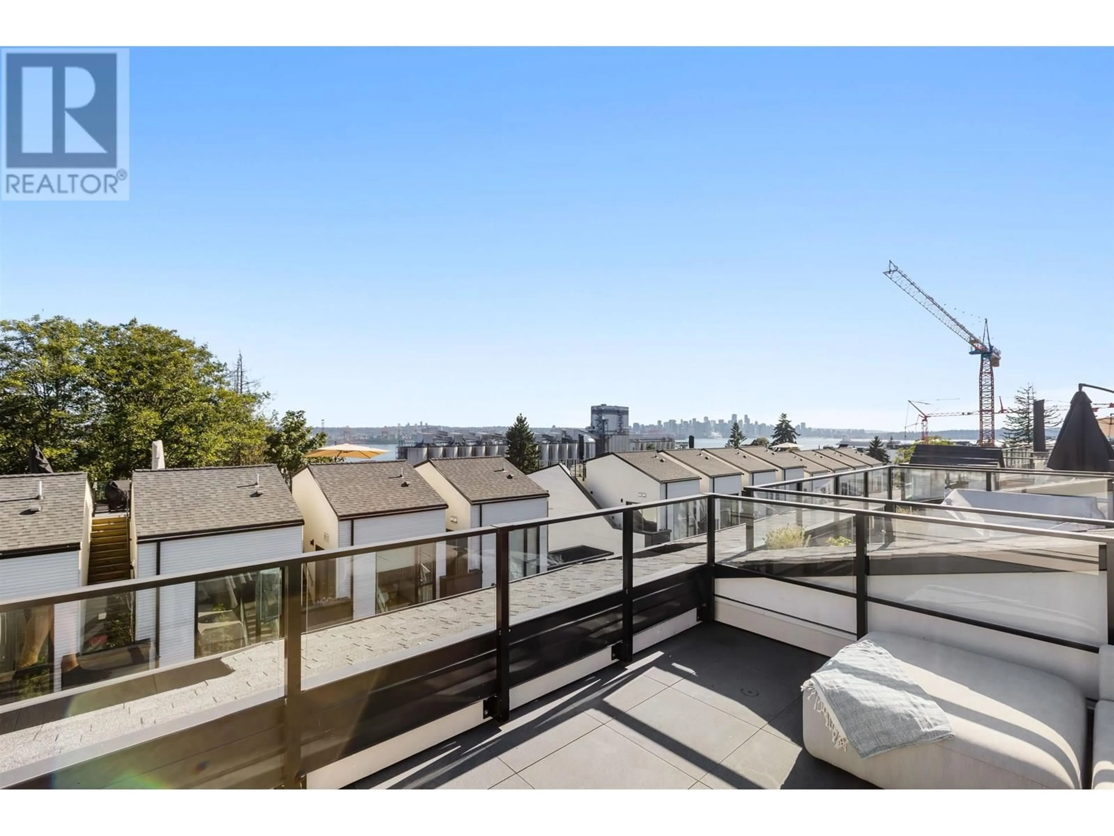 A pic from outside/outdoor area/front of a property/back of a property/a pic from drone, city buildings view from balcony for 222 - 650 2ND STREET, North Vancouver British Columbia V7L1E3