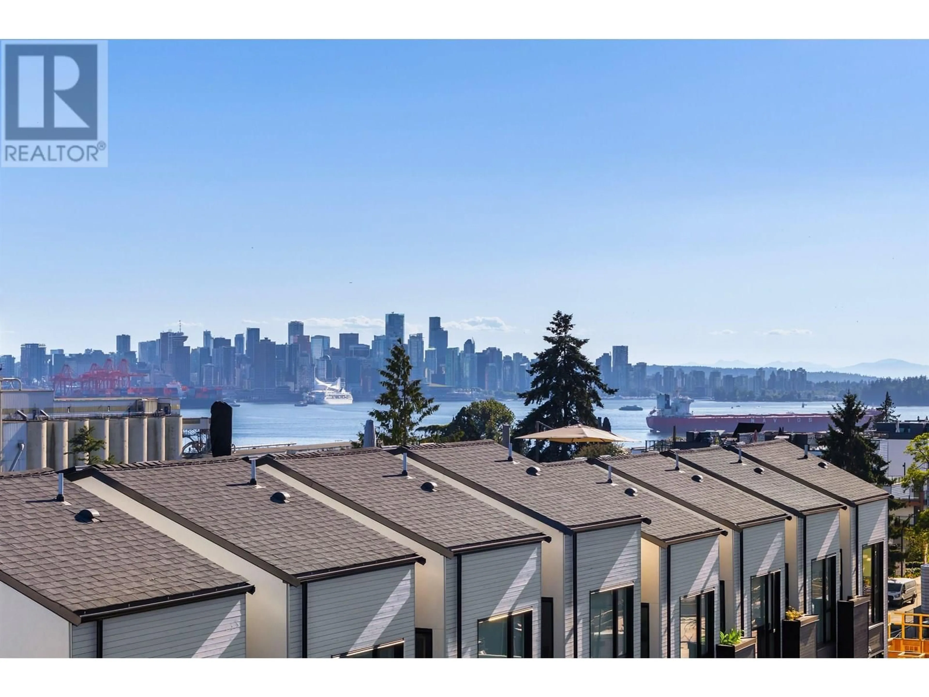 A pic from outside/outdoor area/front of a property/back of a property/a pic from drone, water/lake/river/ocean view for 222 - 650 2ND STREET, North Vancouver British Columbia V7L1E3