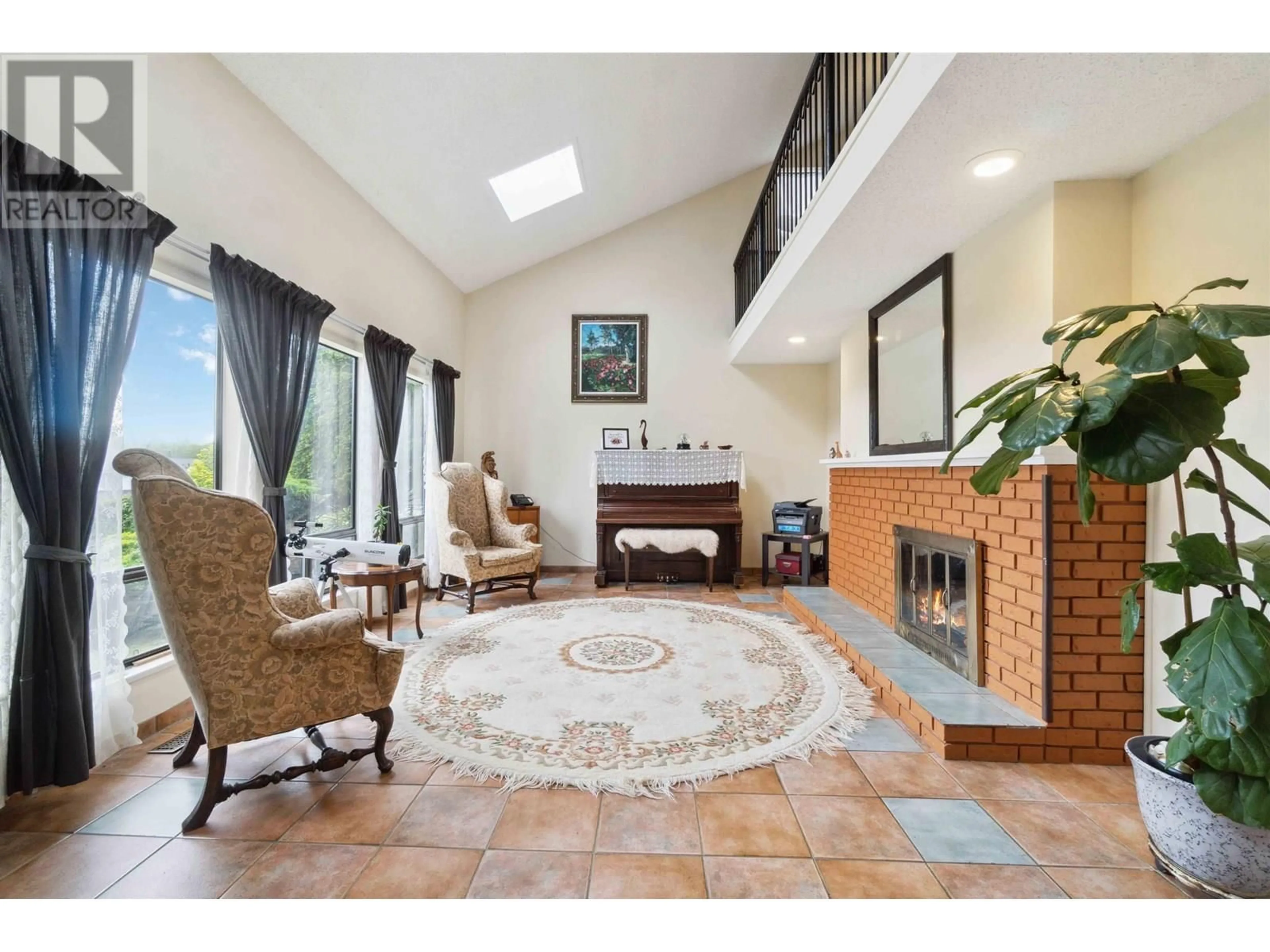 Living room with furniture, ceramic/tile floor for 5694 GREENLAND DRIVE, Delta British Columbia V4L2J5