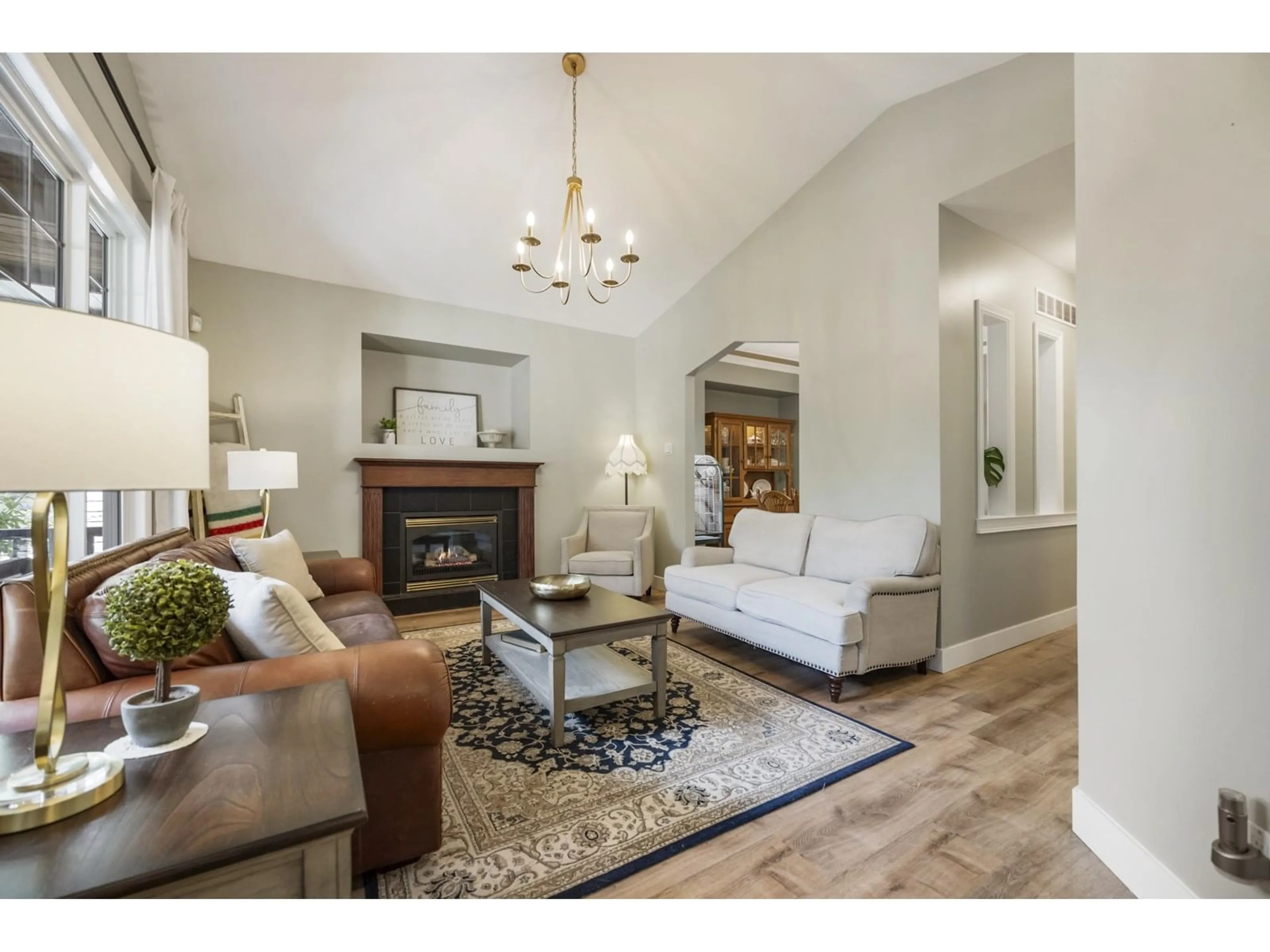 Living room with furniture, wood/laminate floor for 17850 100A, Surrey British Columbia V4N5C8