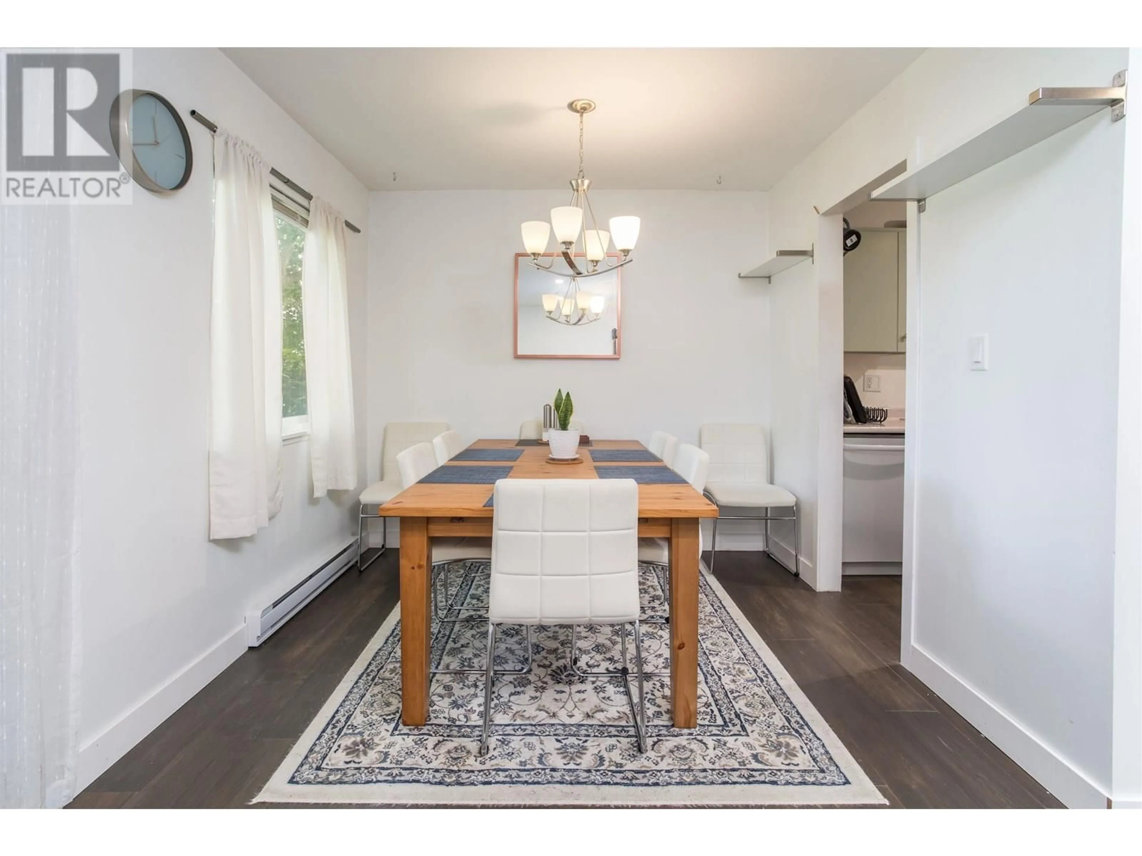 Dining room, wood/laminate floor for 102 - 3391 SPRINGFIELD DRIVE, Richmond British Columbia V7E1Y9