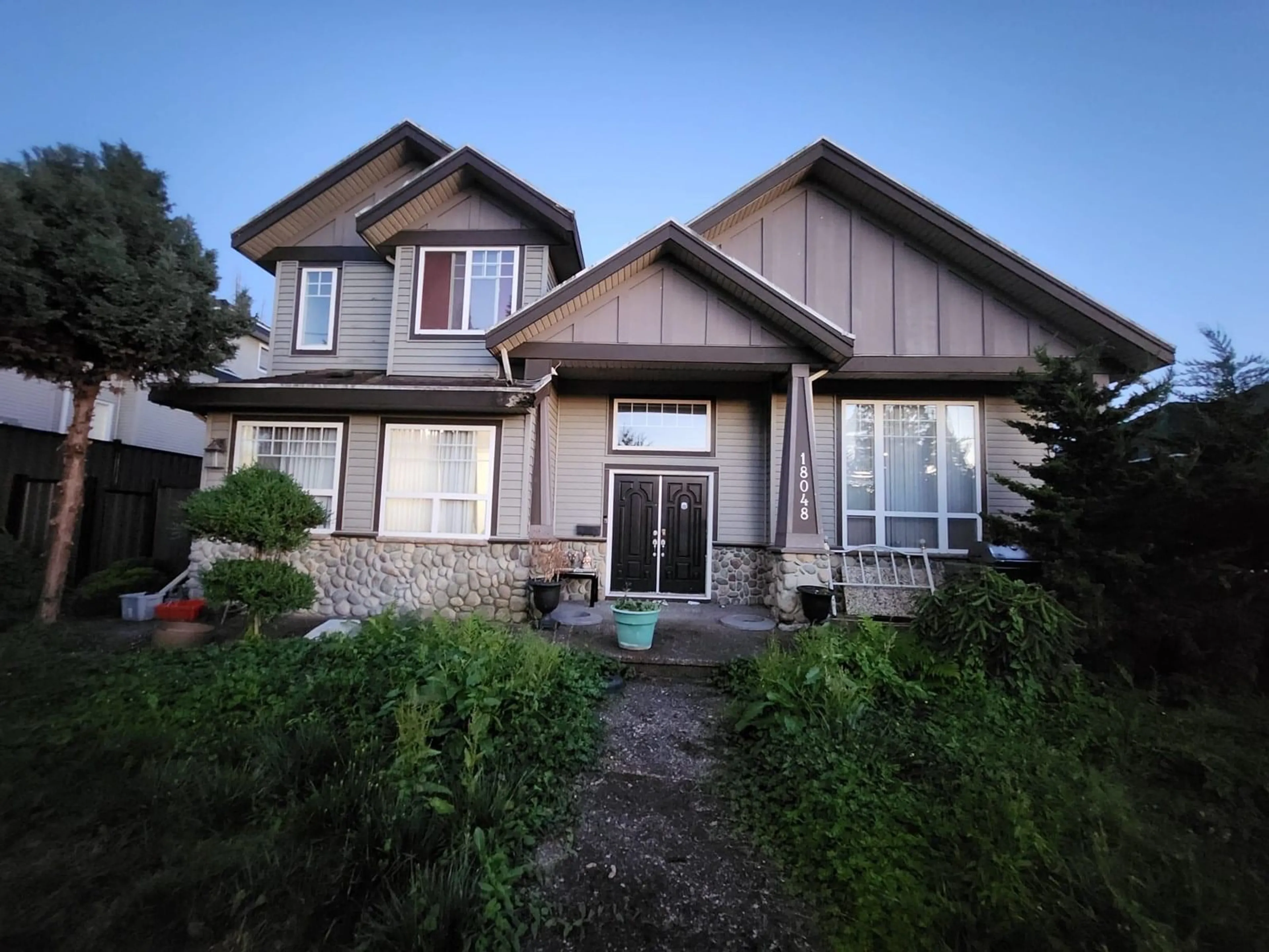 Home with vinyl exterior material, street for 18048 64, Surrey British Columbia V3S1Z5