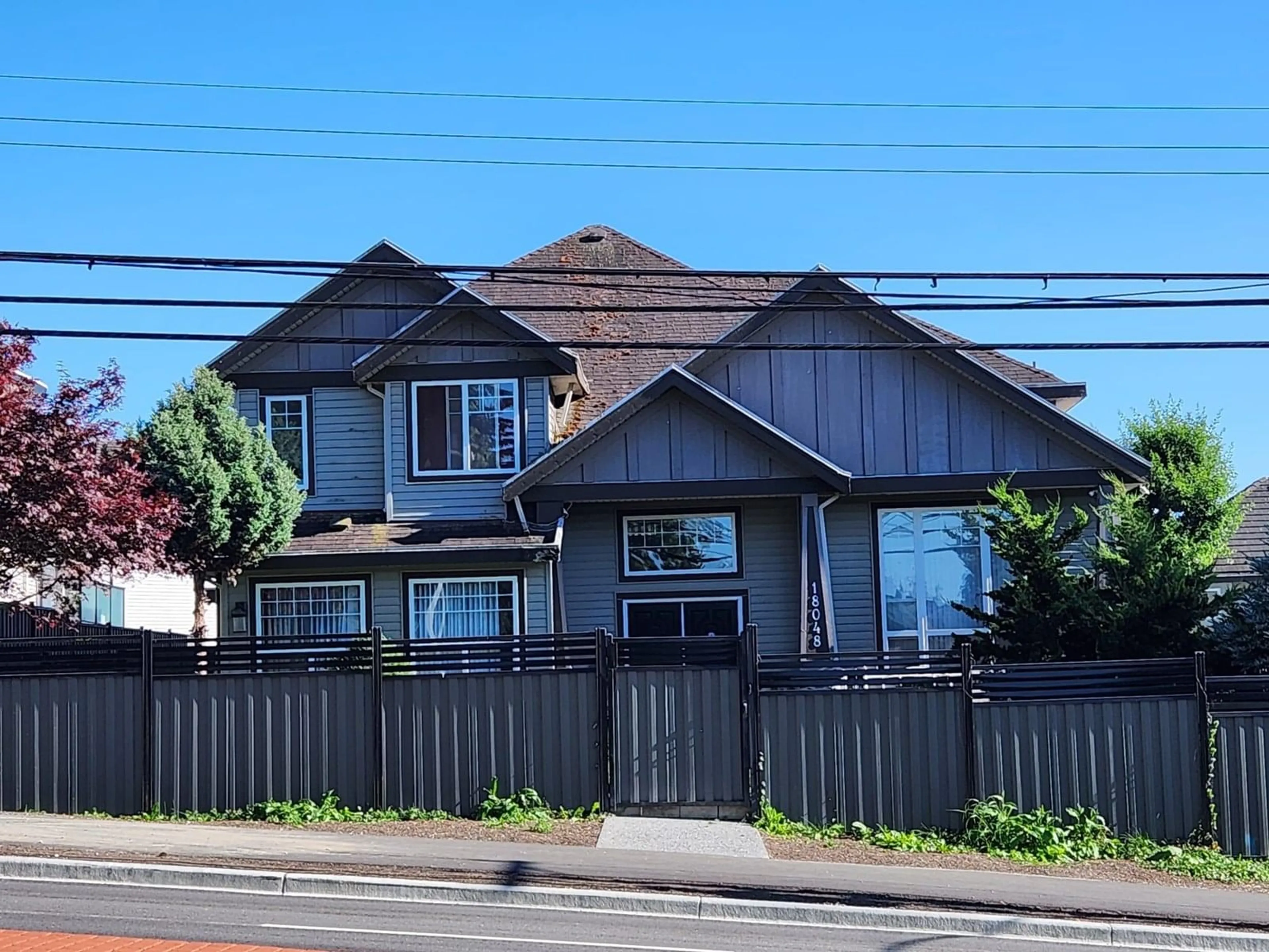 A pic from outside/outdoor area/front of a property/back of a property/a pic from drone, street for 18048 64, Surrey British Columbia V3S1Z5