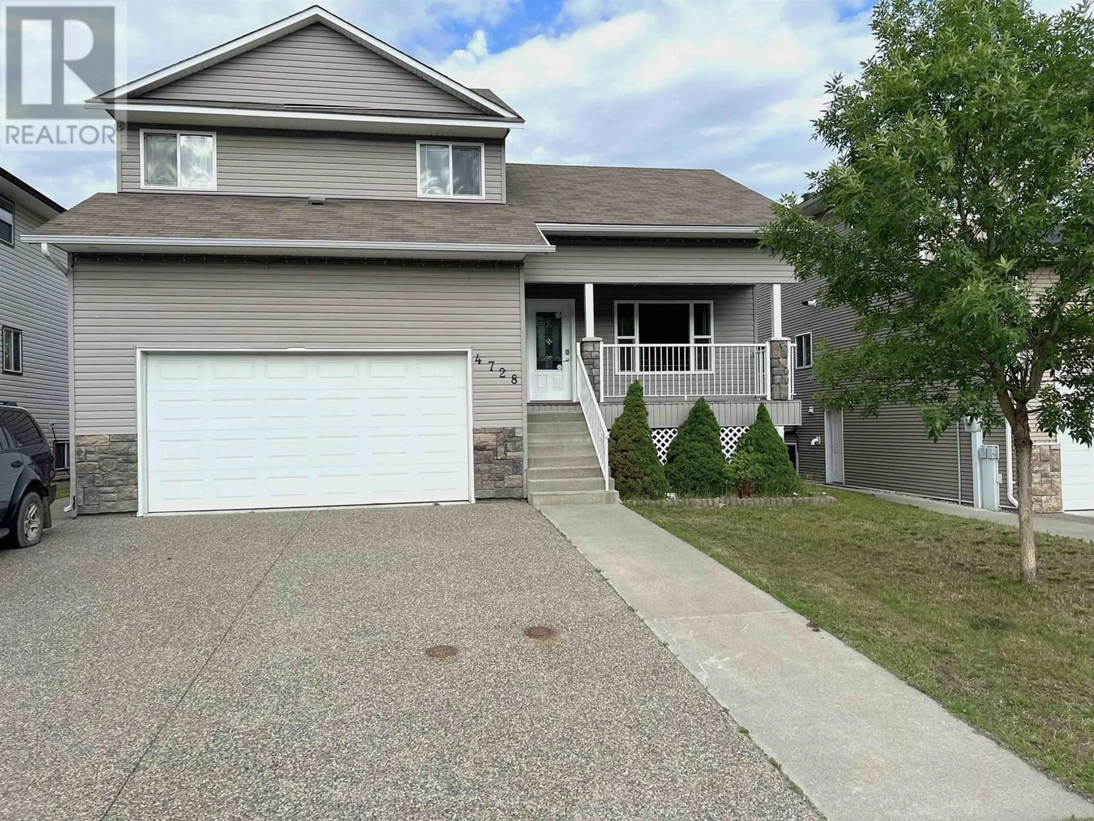 Home with vinyl exterior material, street for 4728 HILL AVENUE, Prince George British Columbia V2M0A5