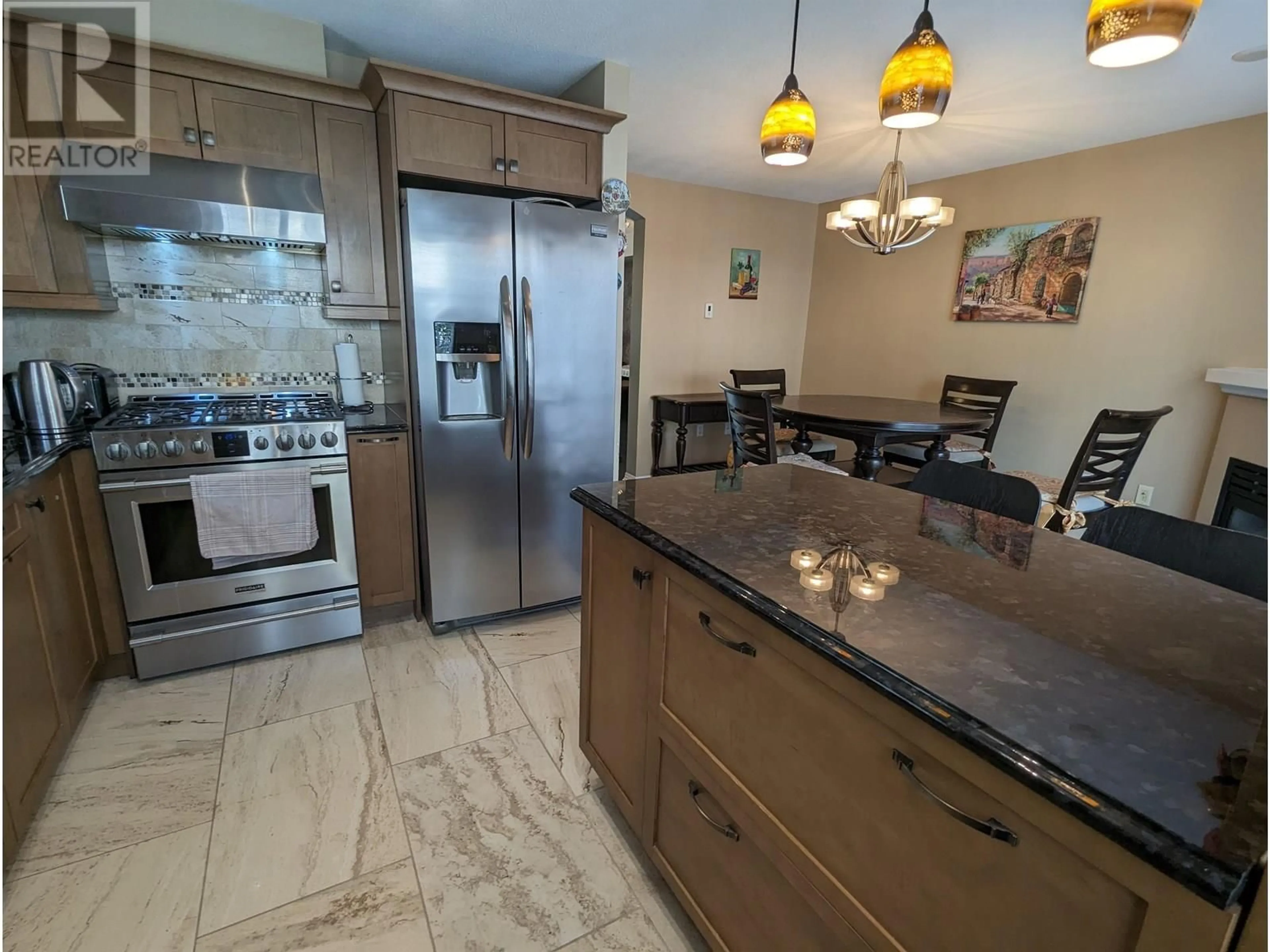 Open concept kitchen, ceramic/tile floor for 134 - 3288 NOEL DRIVE, Burnaby British Columbia V3J1J8