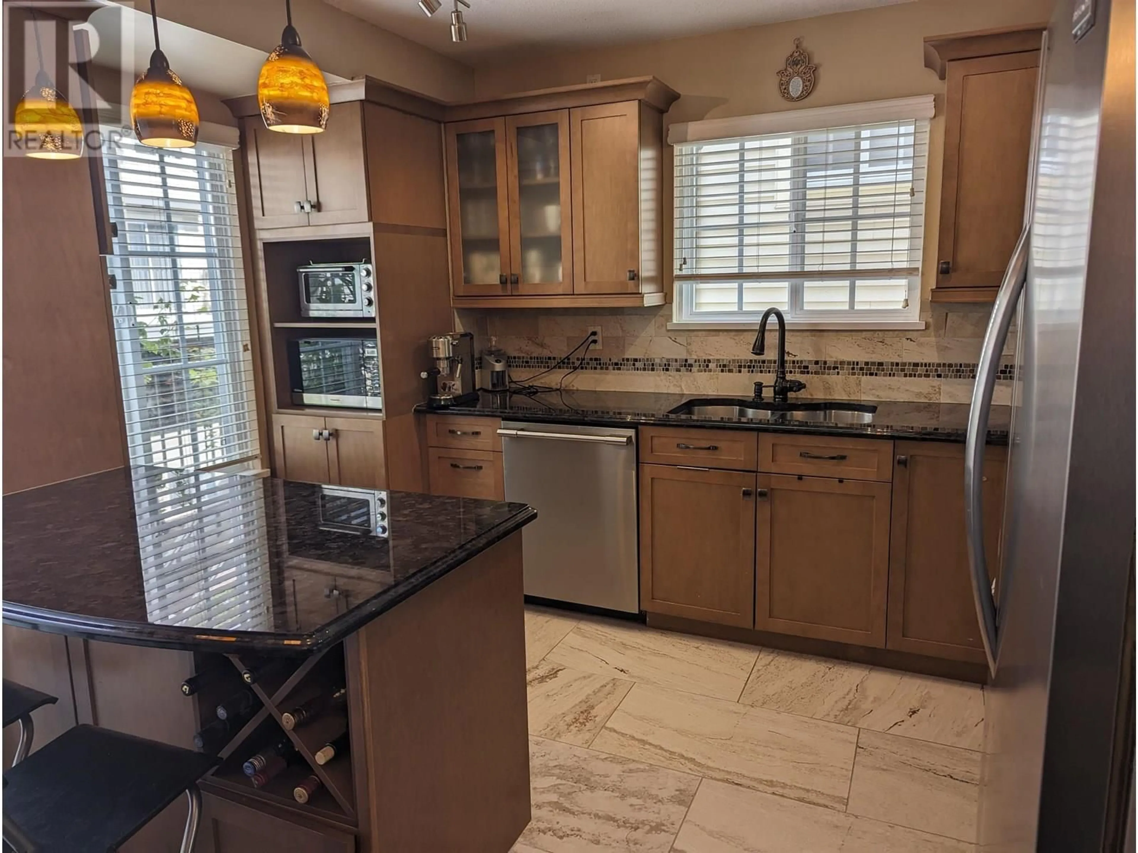 Open concept kitchen, ceramic/tile floor for 134 - 3288 NOEL DRIVE, Burnaby British Columbia V3J1J8