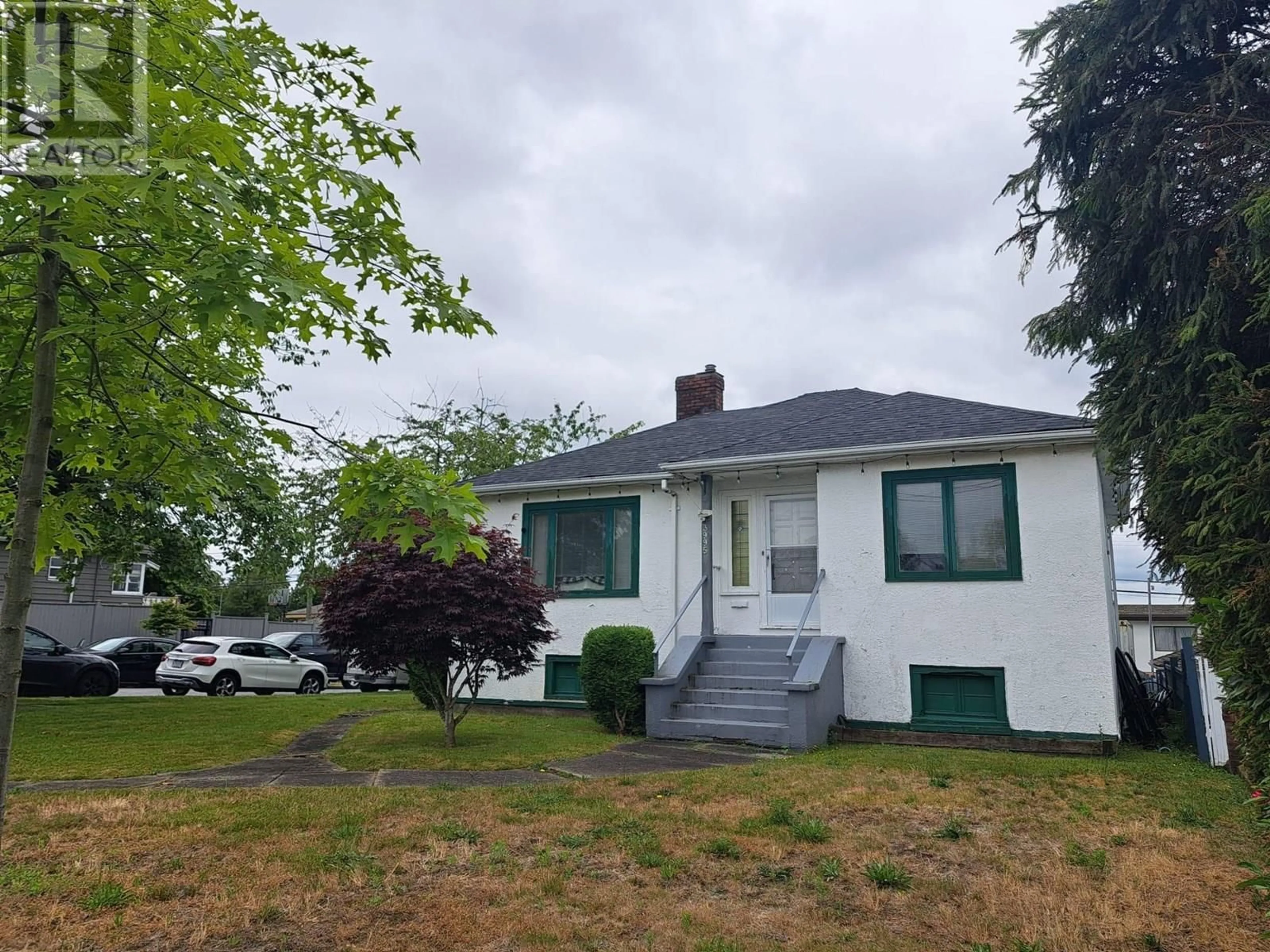 A pic from outside/outdoor area/front of a property/back of a property/a pic from drone, street for 3995 SLOCAN STREET, Vancouver British Columbia V5R1Y7