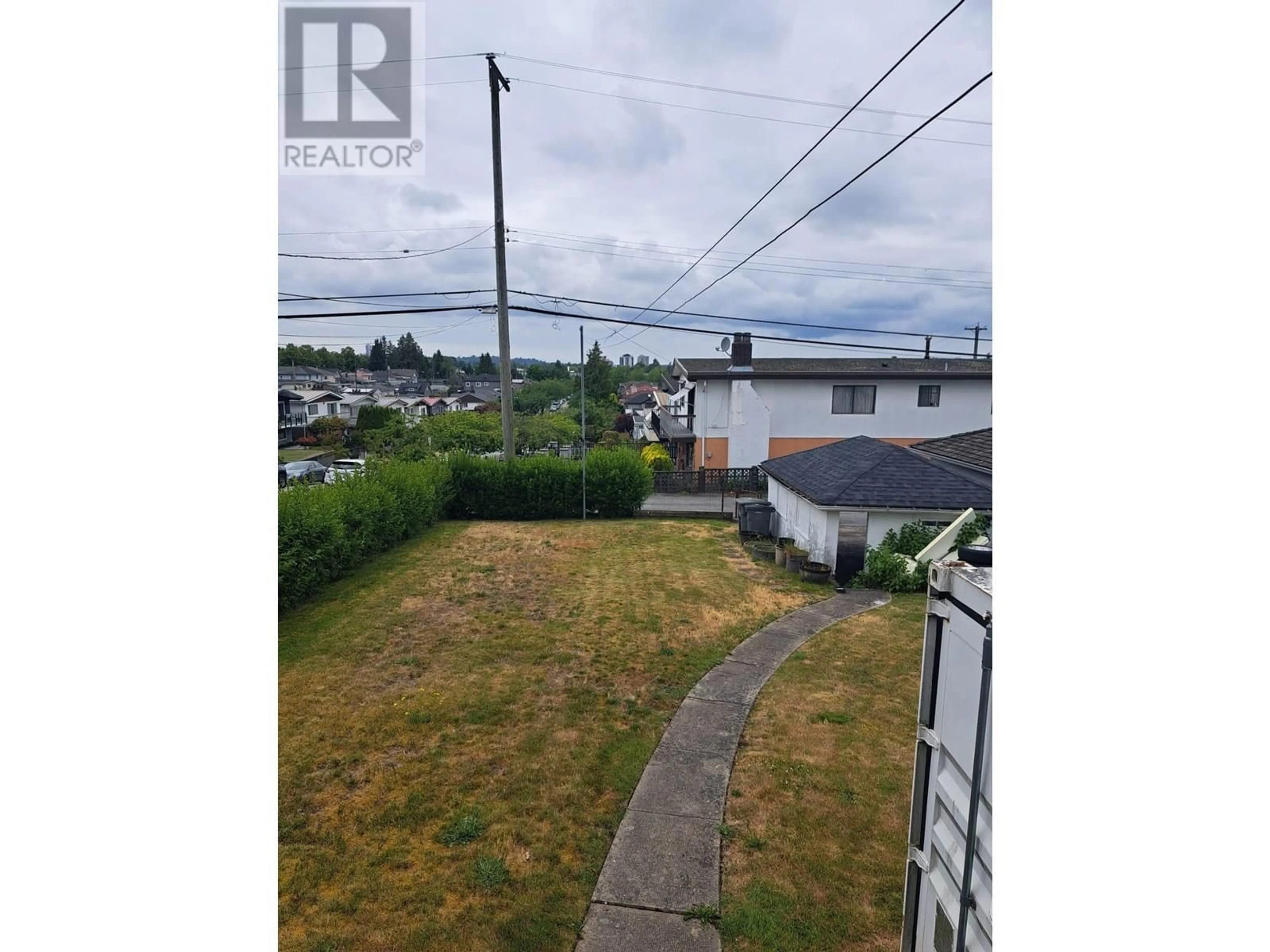 A pic from outside/outdoor area/front of a property/back of a property/a pic from drone, water/lake/river/ocean view for 3995 SLOCAN STREET, Vancouver British Columbia V5R1Y7