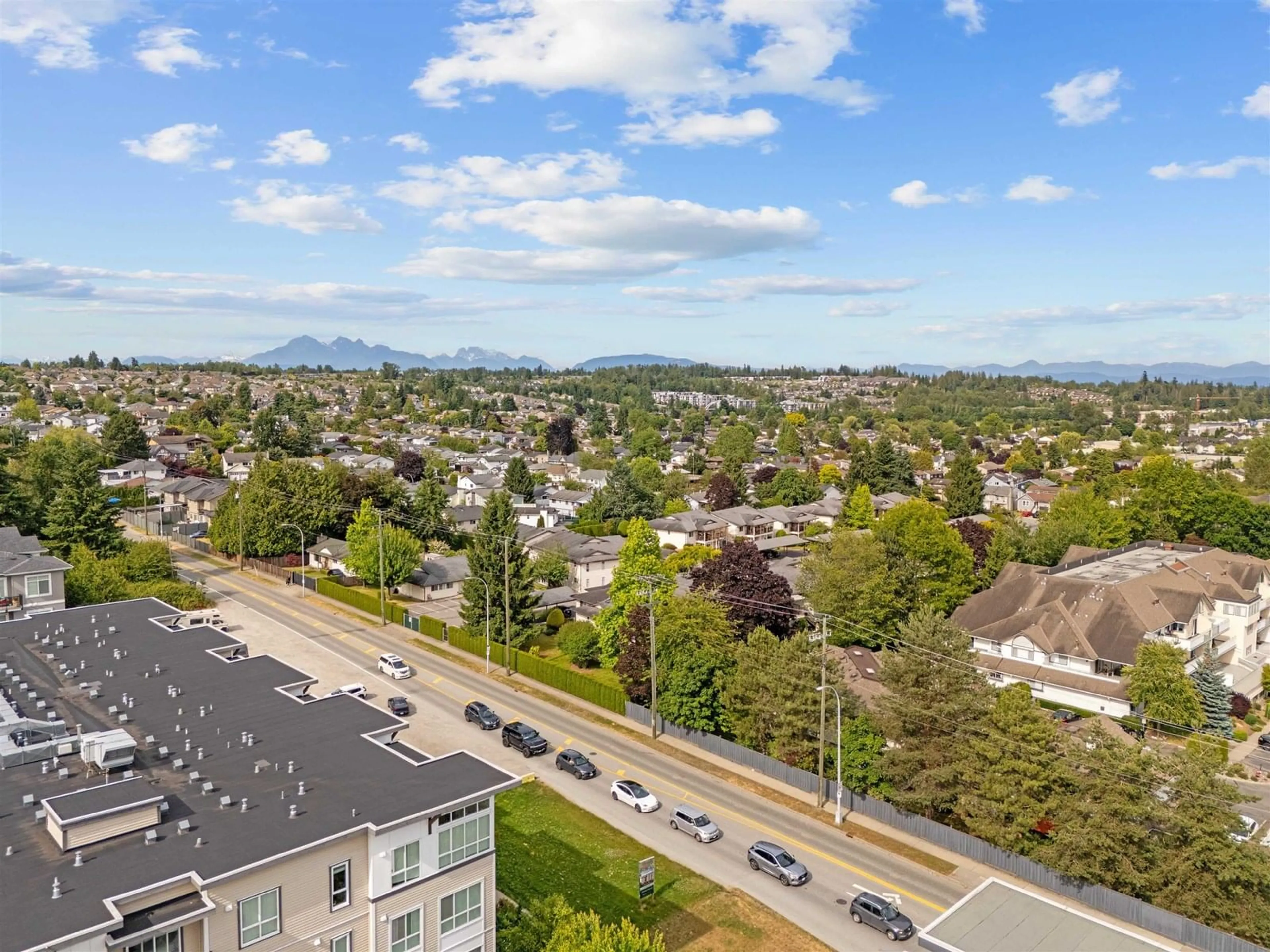 A pic from outside/outdoor area/front of a property/back of a property/a pic from drone, mountain view for 216 - 6438 195A, Surrey British Columbia V4N6R5