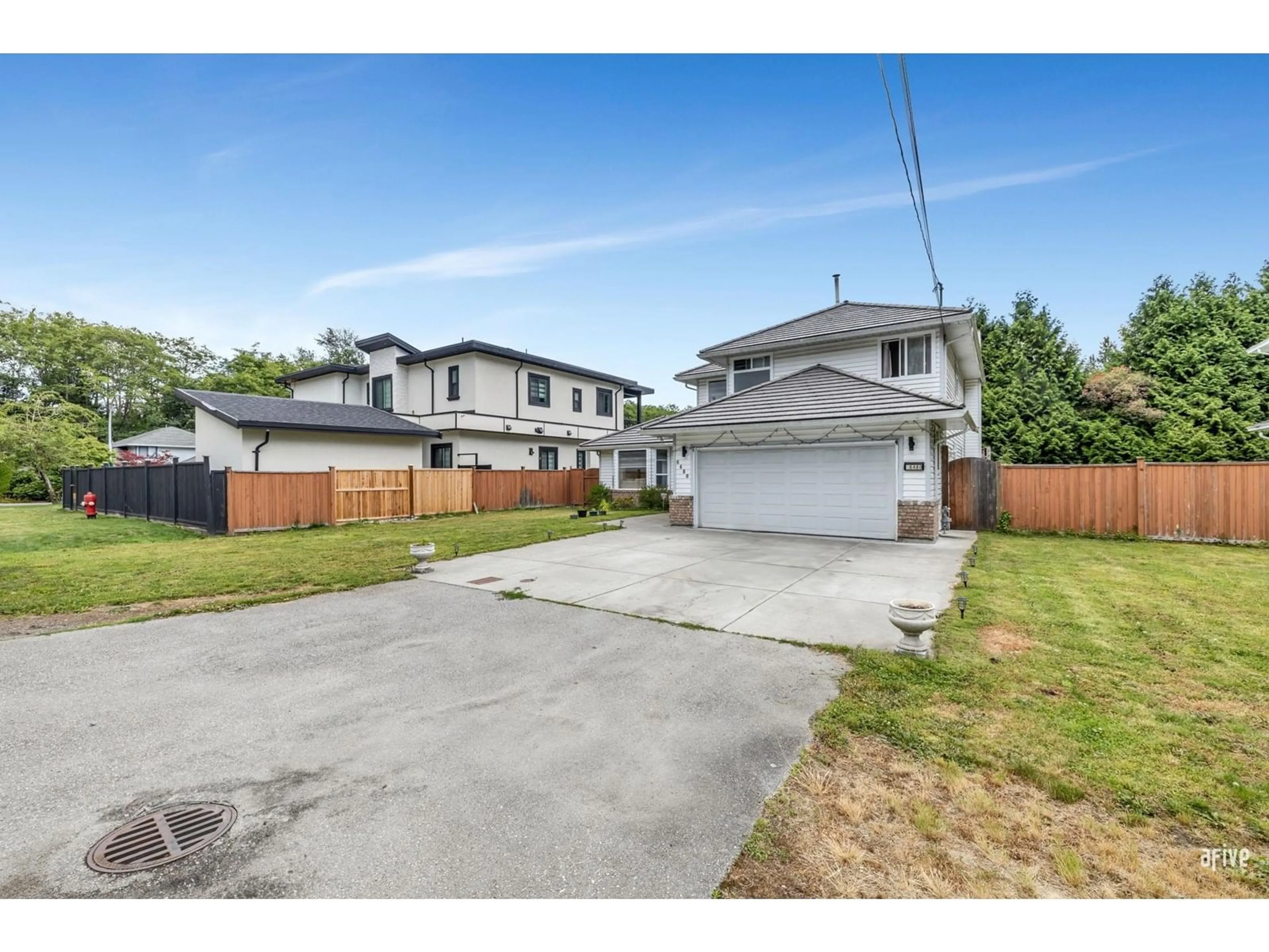 A pic from outside/outdoor area/front of a property/back of a property/a pic from drone, street for 6480 138, Surrey British Columbia V3W5G6