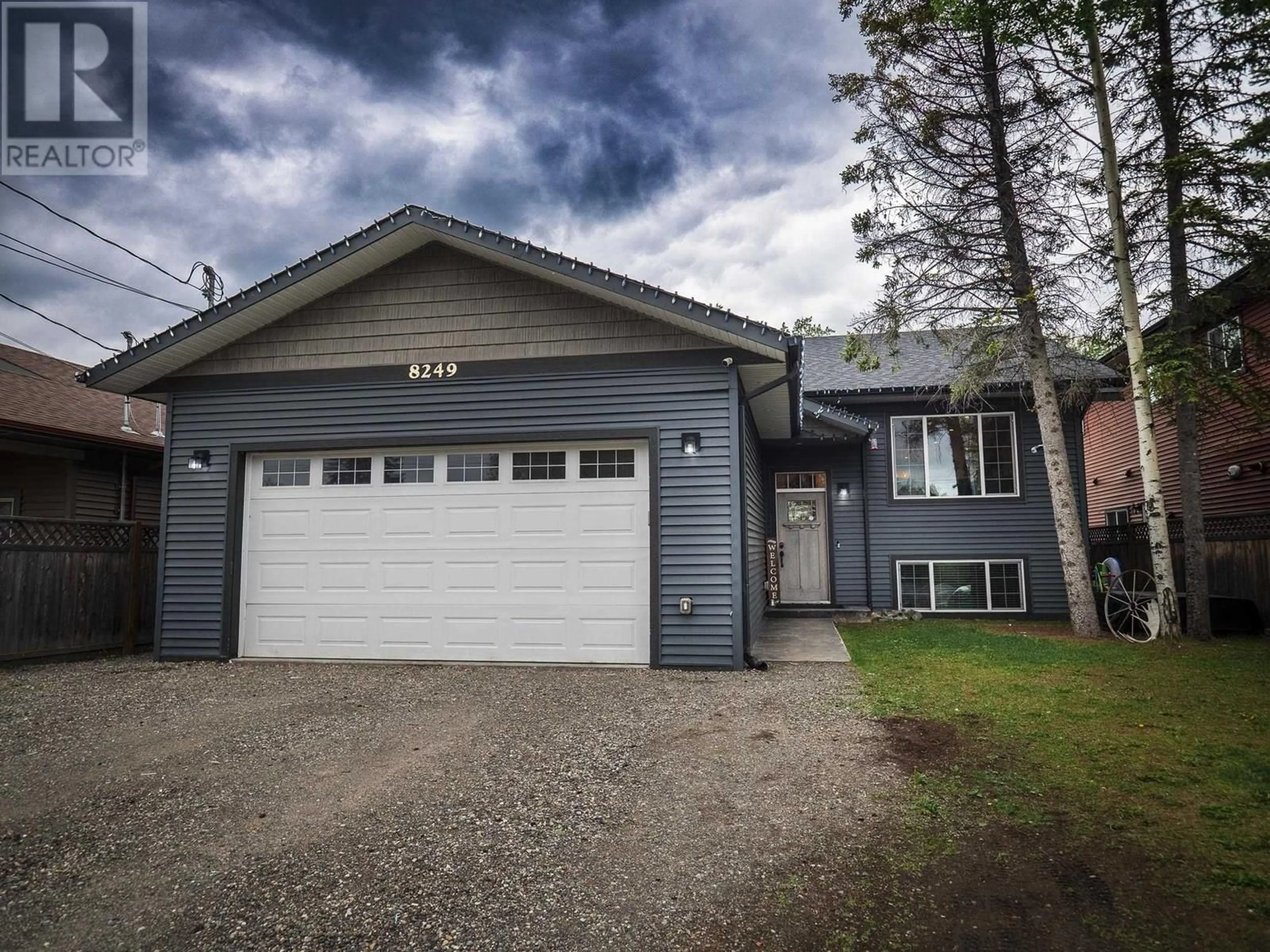 Home with vinyl exterior material, street for 8249 PETER ROAD, Prince George British Columbia V2K0B2