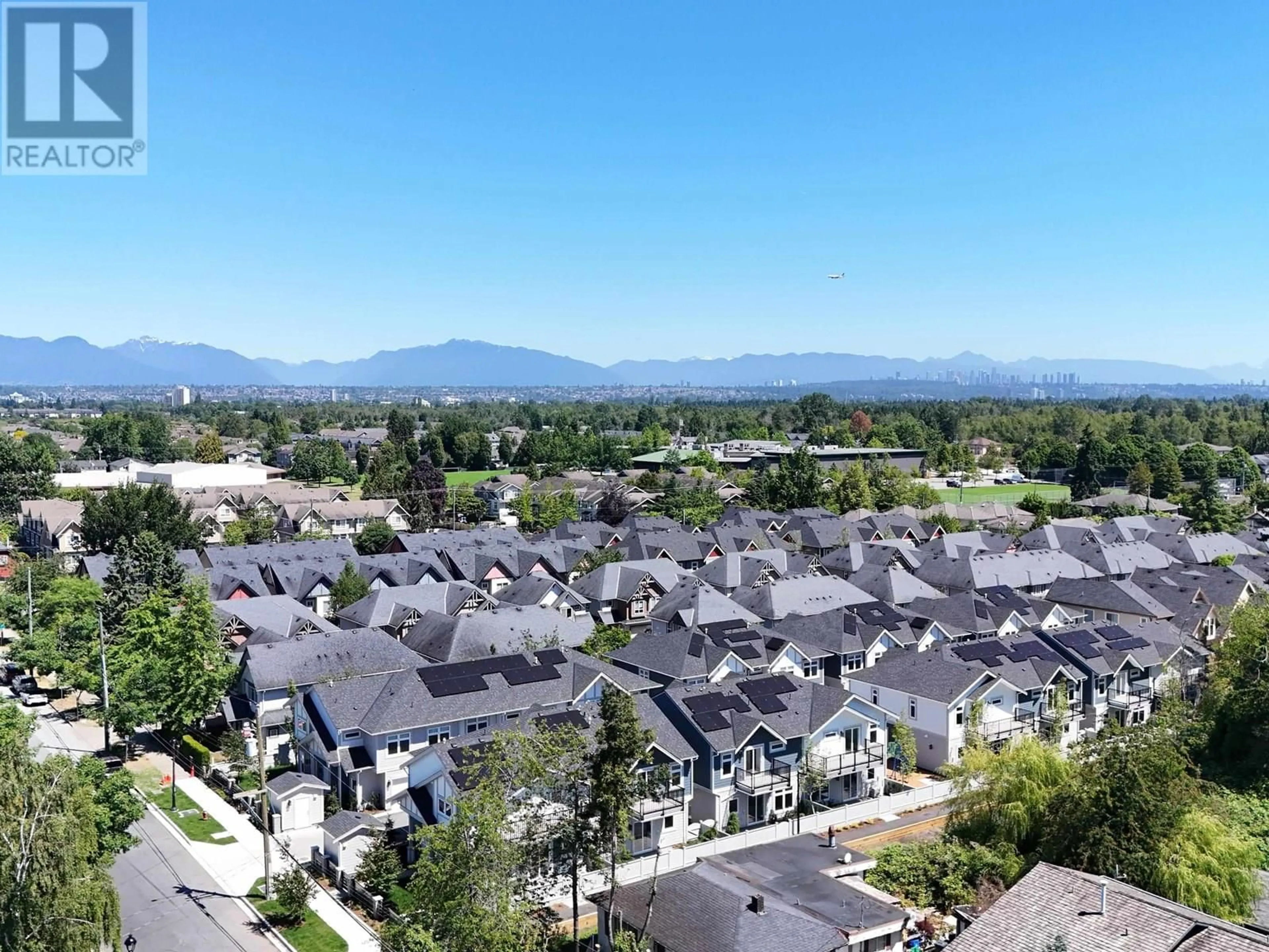 A pic from outside/outdoor area/front of a property/back of a property/a pic from drone, mountain view for 15 - 7100 ASH STREET, Richmond British Columbia V6Y0N4