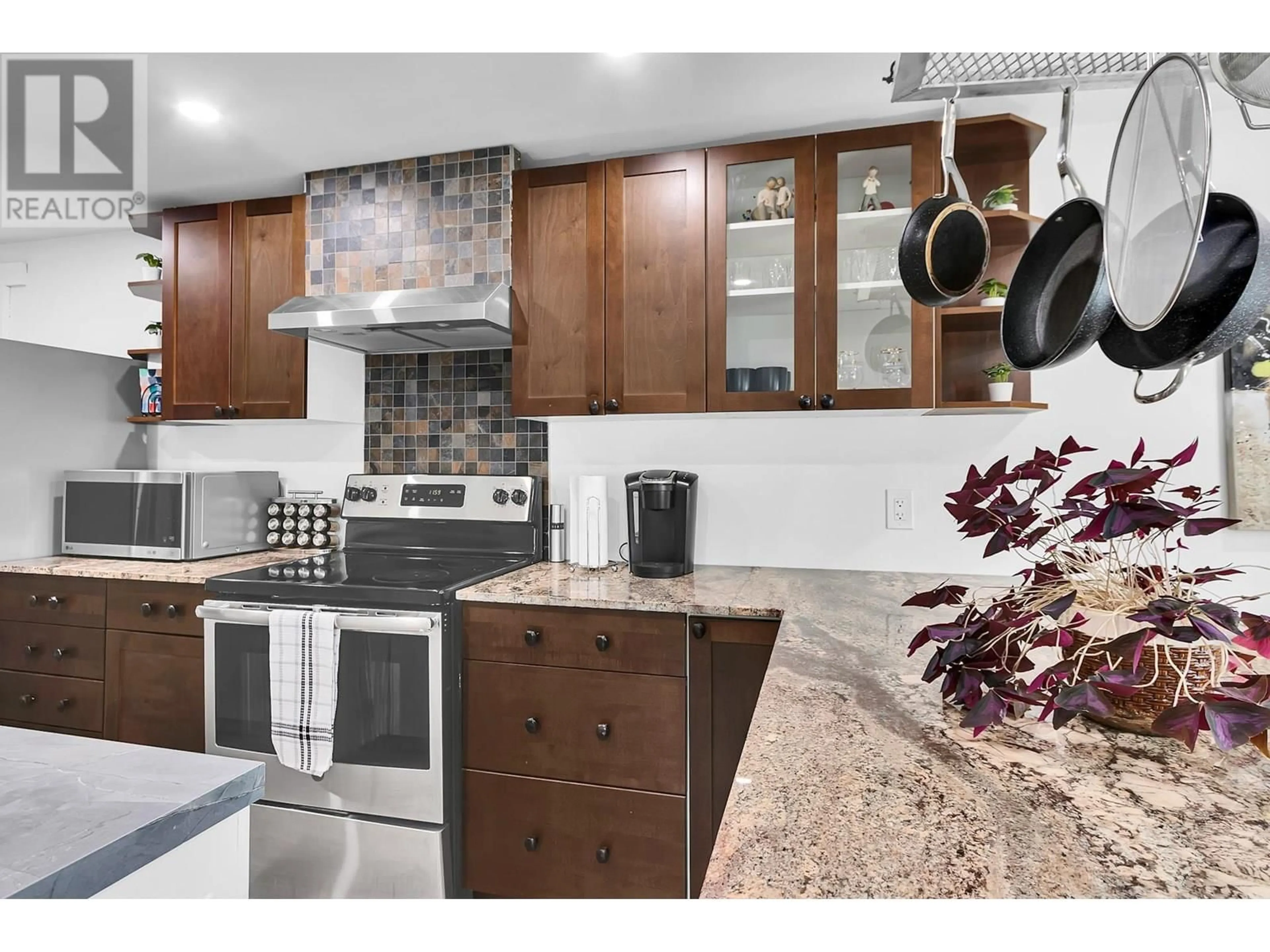 Open concept kitchen, ceramic/tile floor for 3940 BALSUM ROAD, Prince George British Columbia V2K1Z8