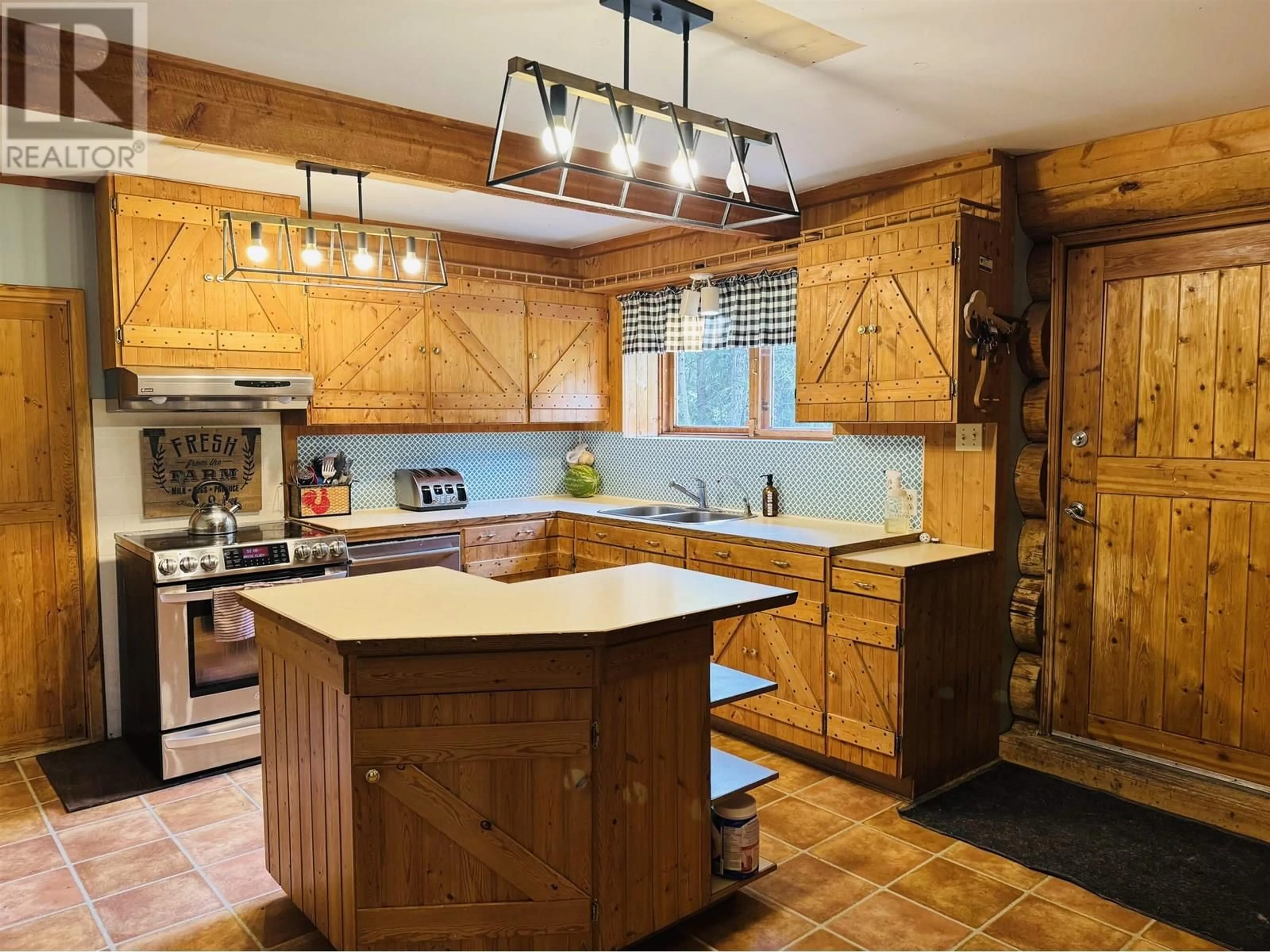 Rustic kitchen, unknown for 2828 PIONEER CRESCENT, 150 Mile House British Columbia V0K2G0