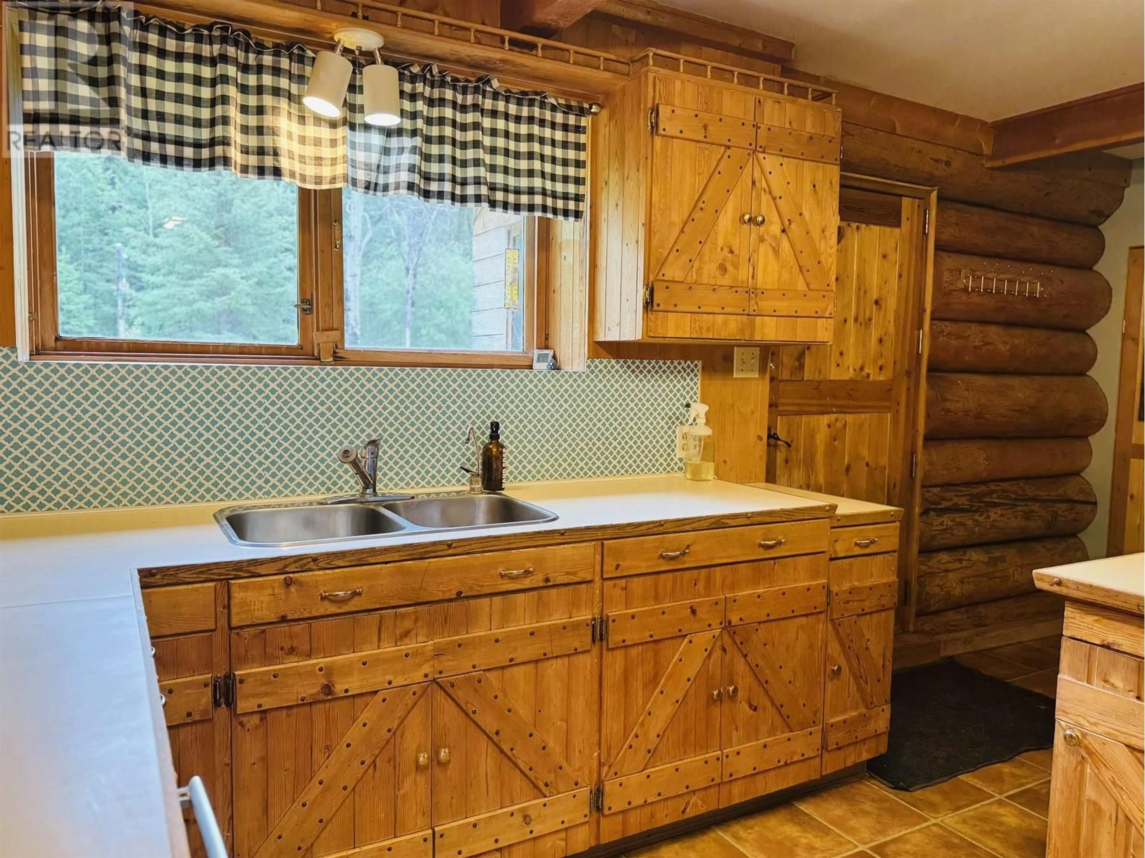 Rustic kitchen, unknown for 2828 PIONEER CRESCENT, 150 Mile House British Columbia V0K2G0