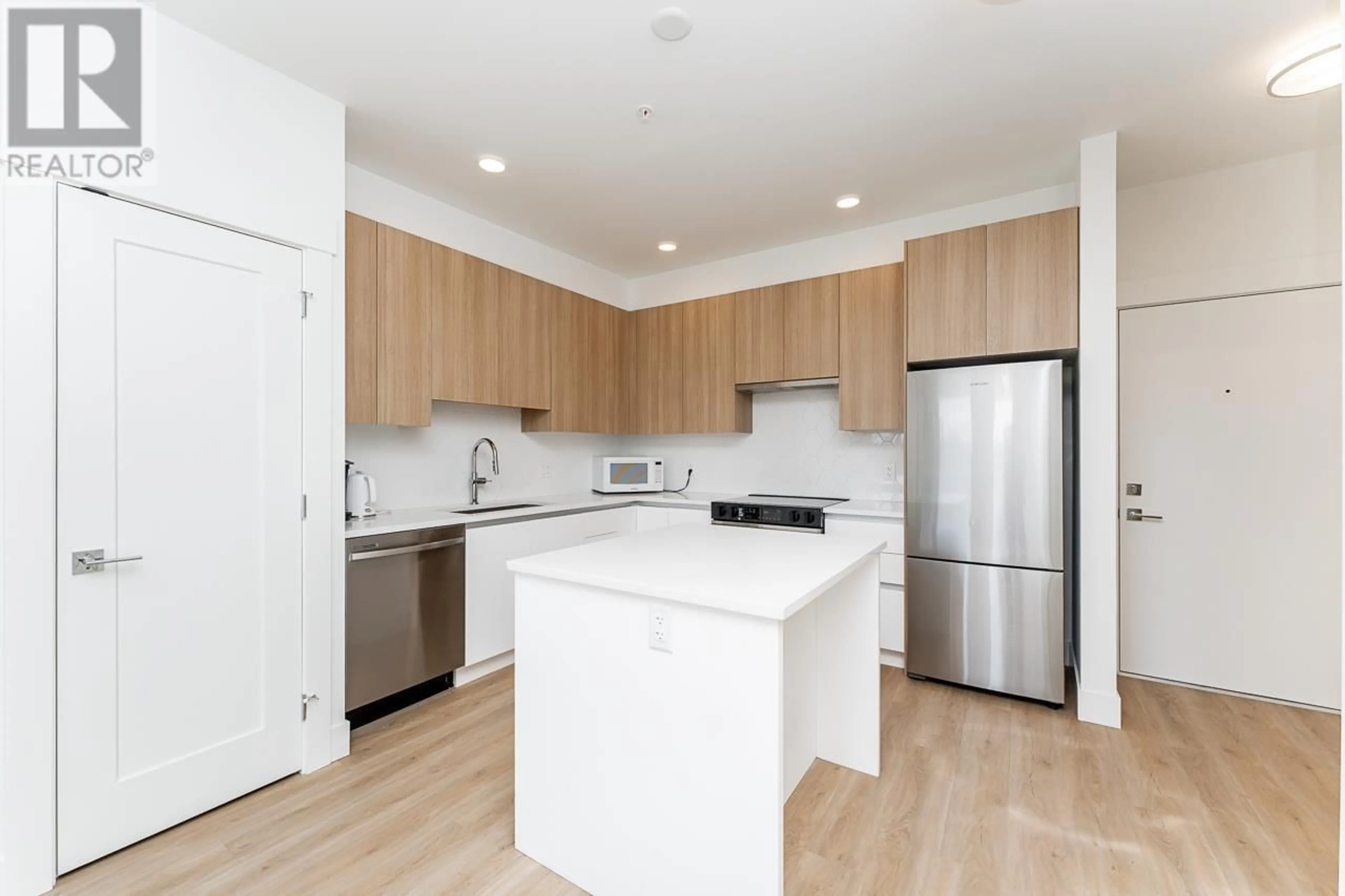 Open concept kitchen, wood/laminate floor for 305 - 11907 223 STREET, Maple Ridge British Columbia V2X4P9