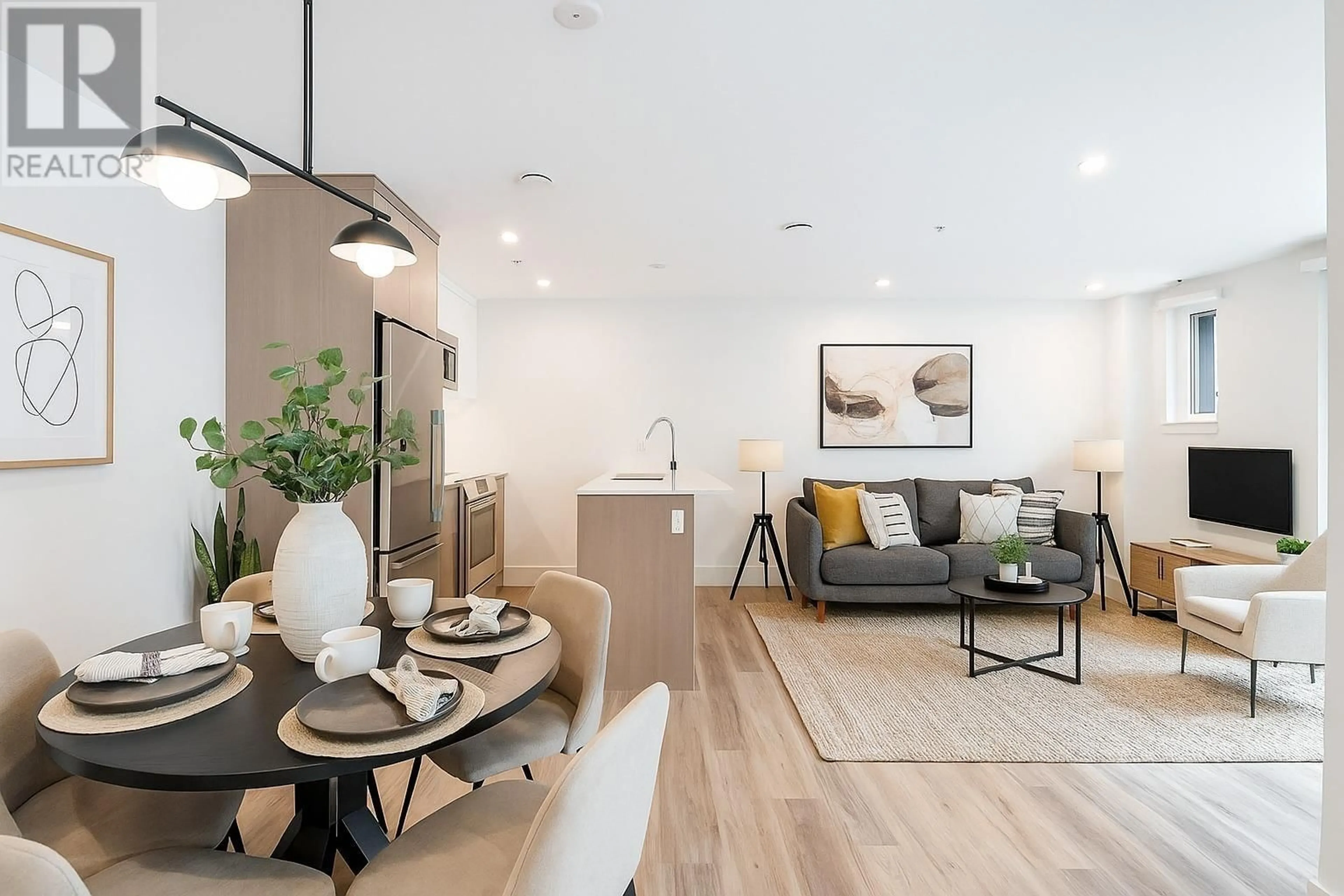 Living room with furniture, wood/laminate floor for 109 - 2085 1ST AVENUE, Vancouver British Columbia V5N1B6