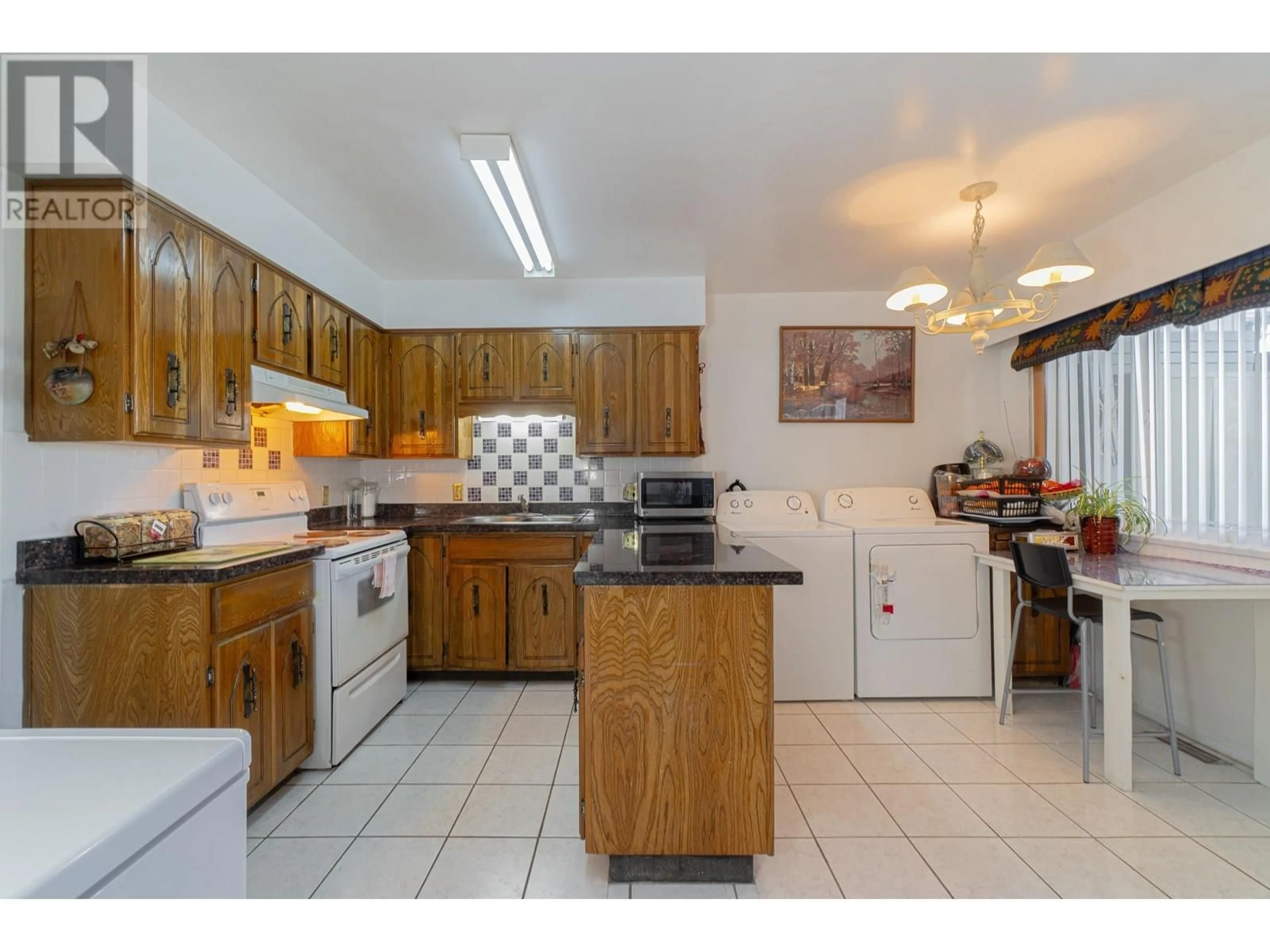 Standard kitchen, ceramic/tile floor for 6675- - 6677 LOCHDALE STREET, Burnaby British Columbia V5B2M7