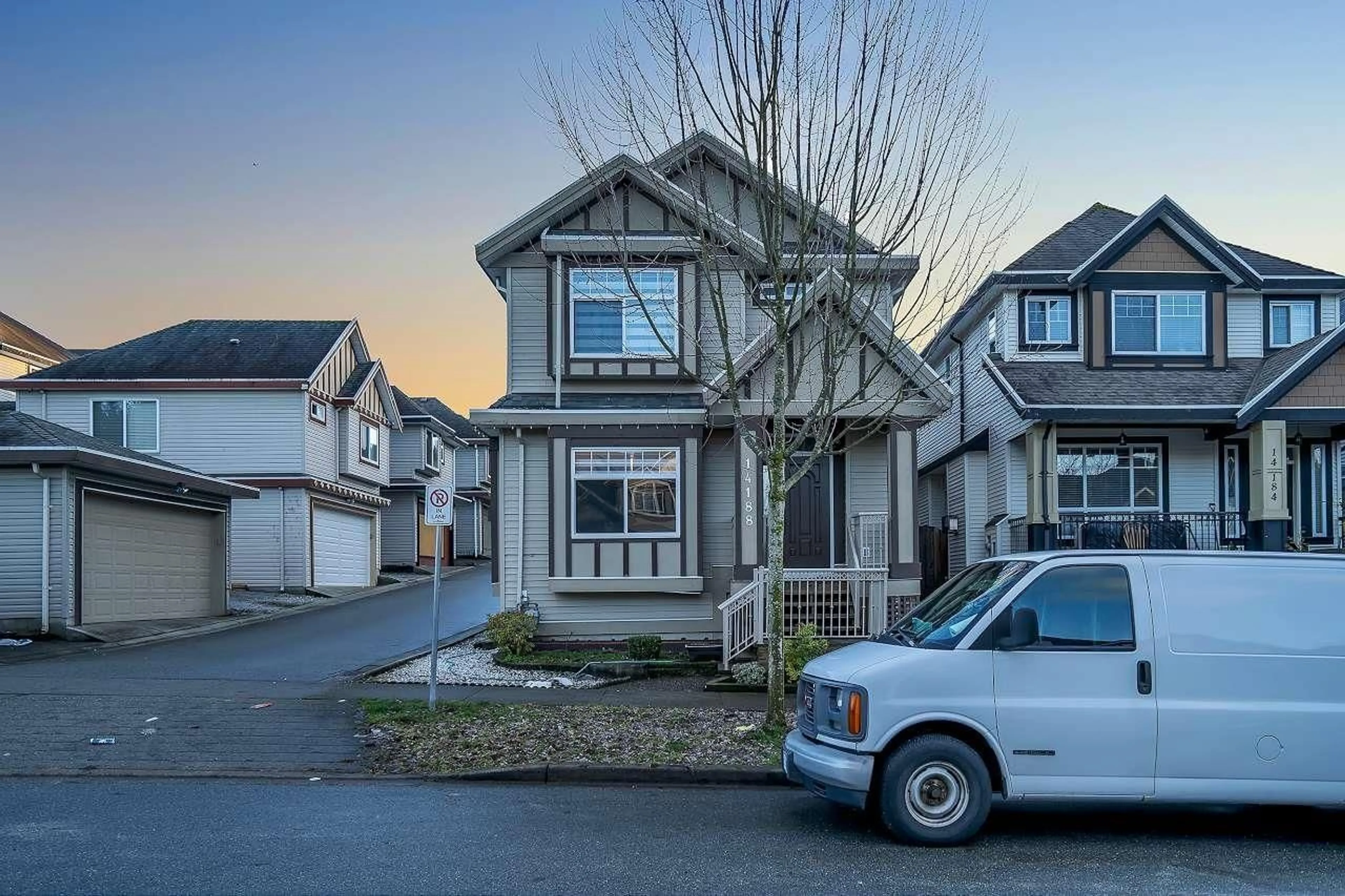 Home with vinyl exterior material, street for 14188 62B, Surrey British Columbia V3X0B3