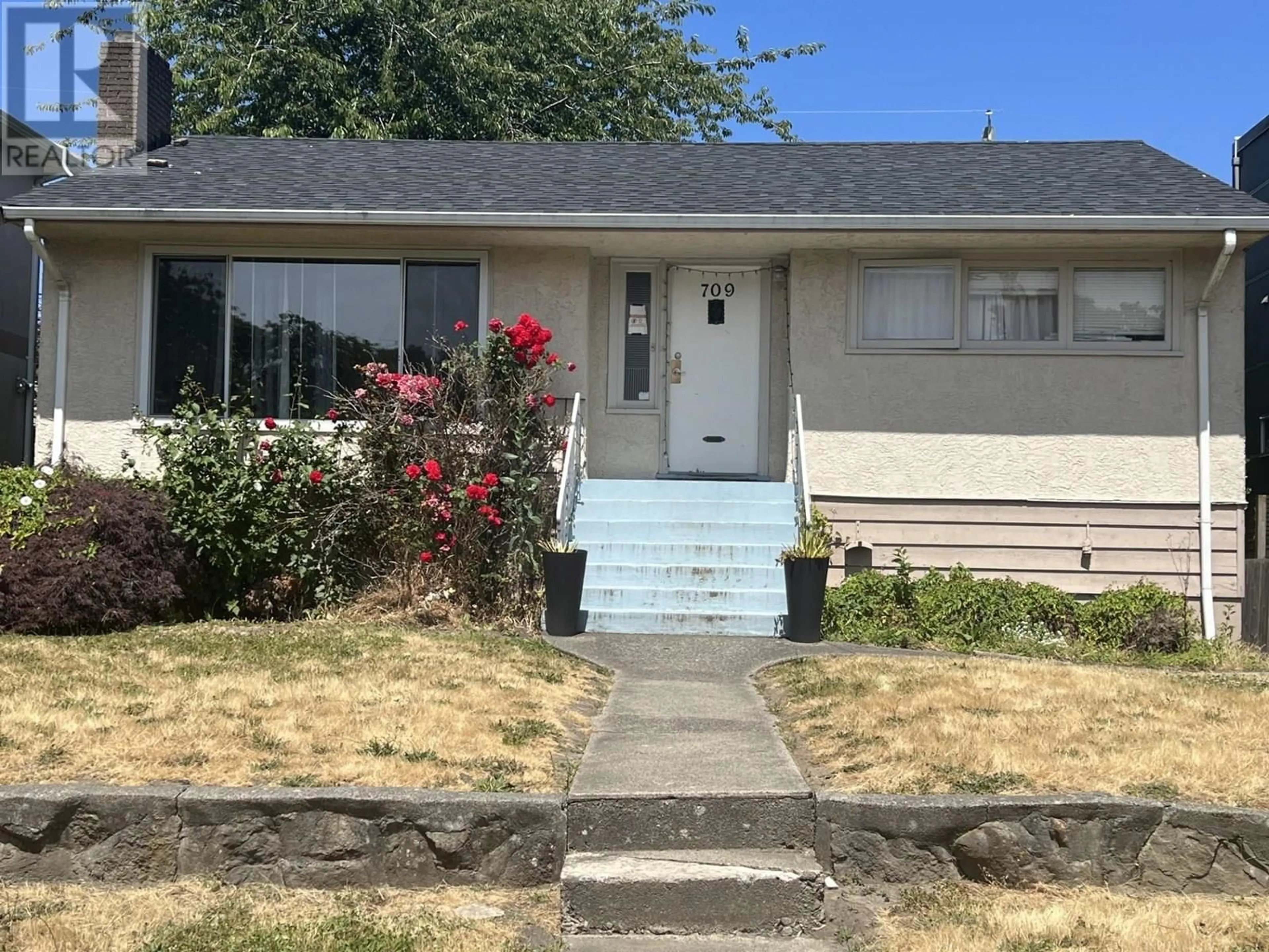 Home with vinyl exterior material, street for 709 64TH AVENUE, Vancouver British Columbia V6P2L2