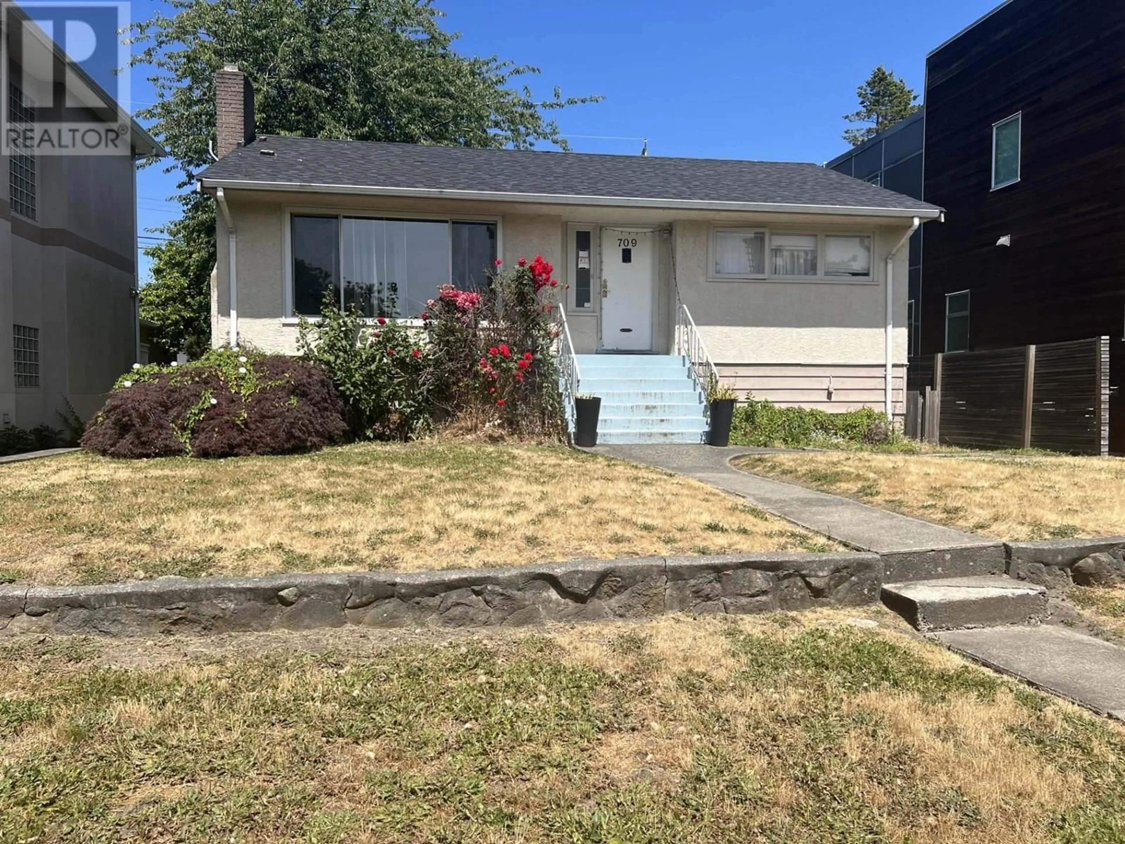 Home with vinyl exterior material, street for 709 64TH AVENUE, Vancouver British Columbia V6P2L2