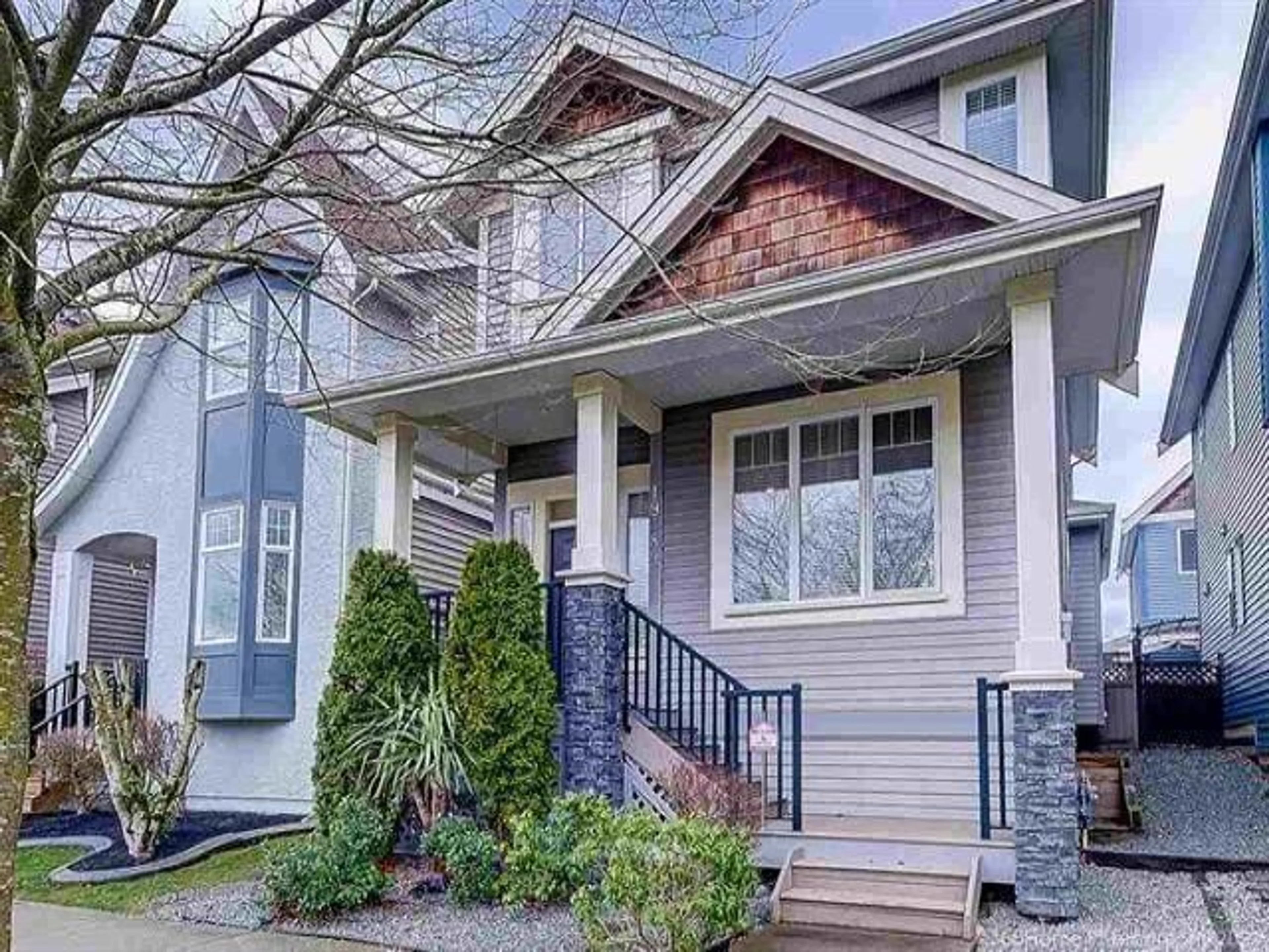 Home with vinyl exterior material, street for 19389 66, Surrey British Columbia V4N0C2