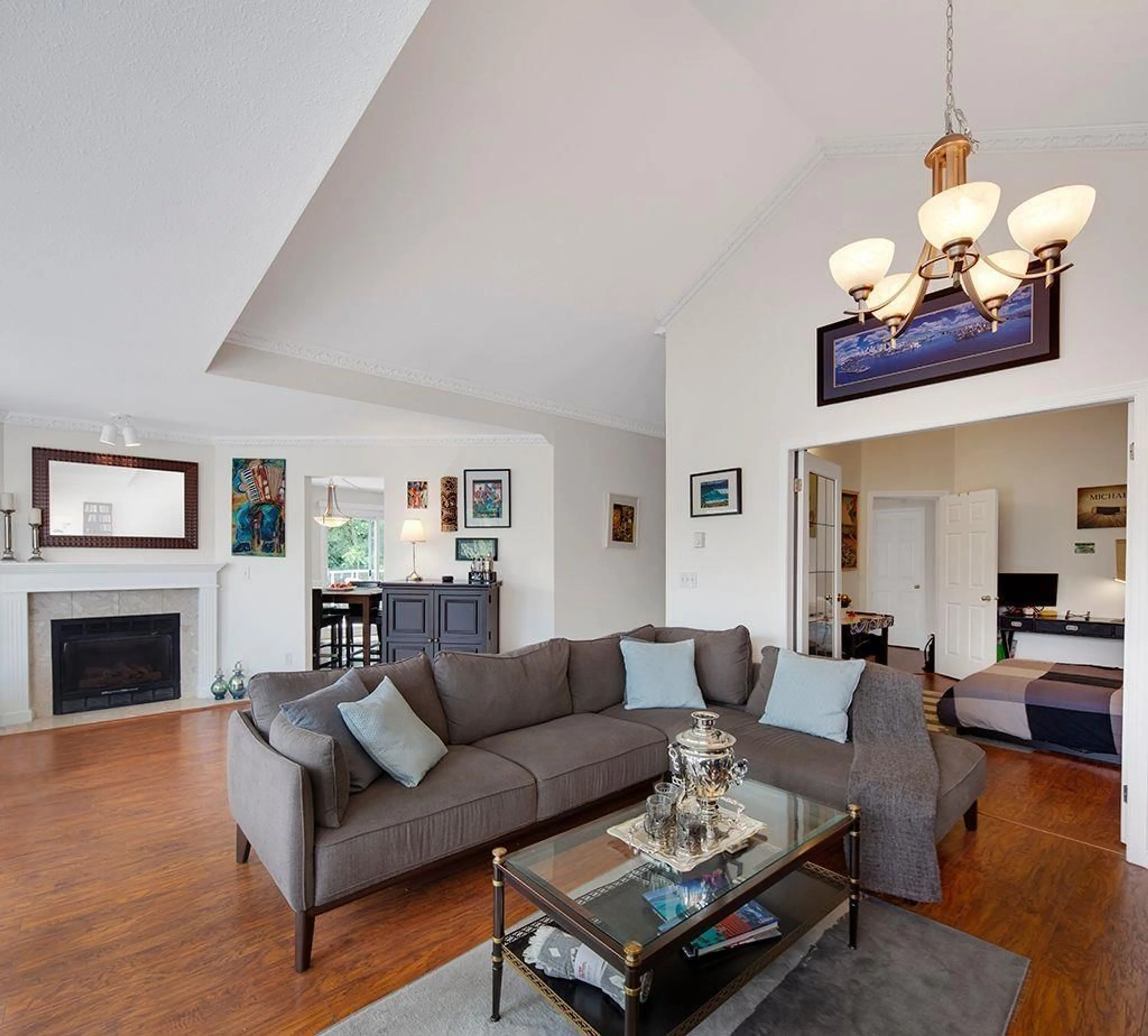 Living room with furniture, wood/laminate floor for 305 - 6866 NICHOLSON, Delta British Columbia V4E3M6