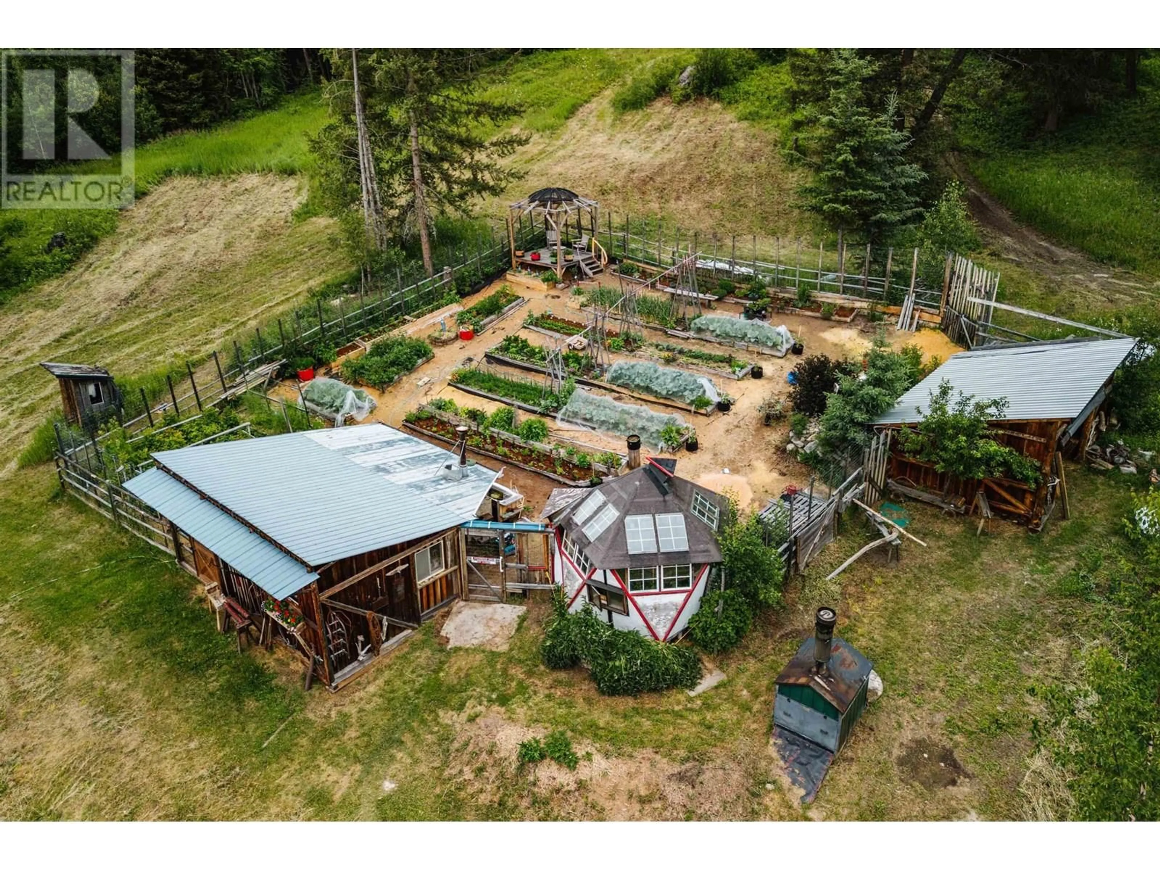 A pic from outside/outdoor area/front of a property/back of a property/a pic from drone, mountain view for 6661 BISS ROAD, Forest Grove British Columbia V0K1M0
