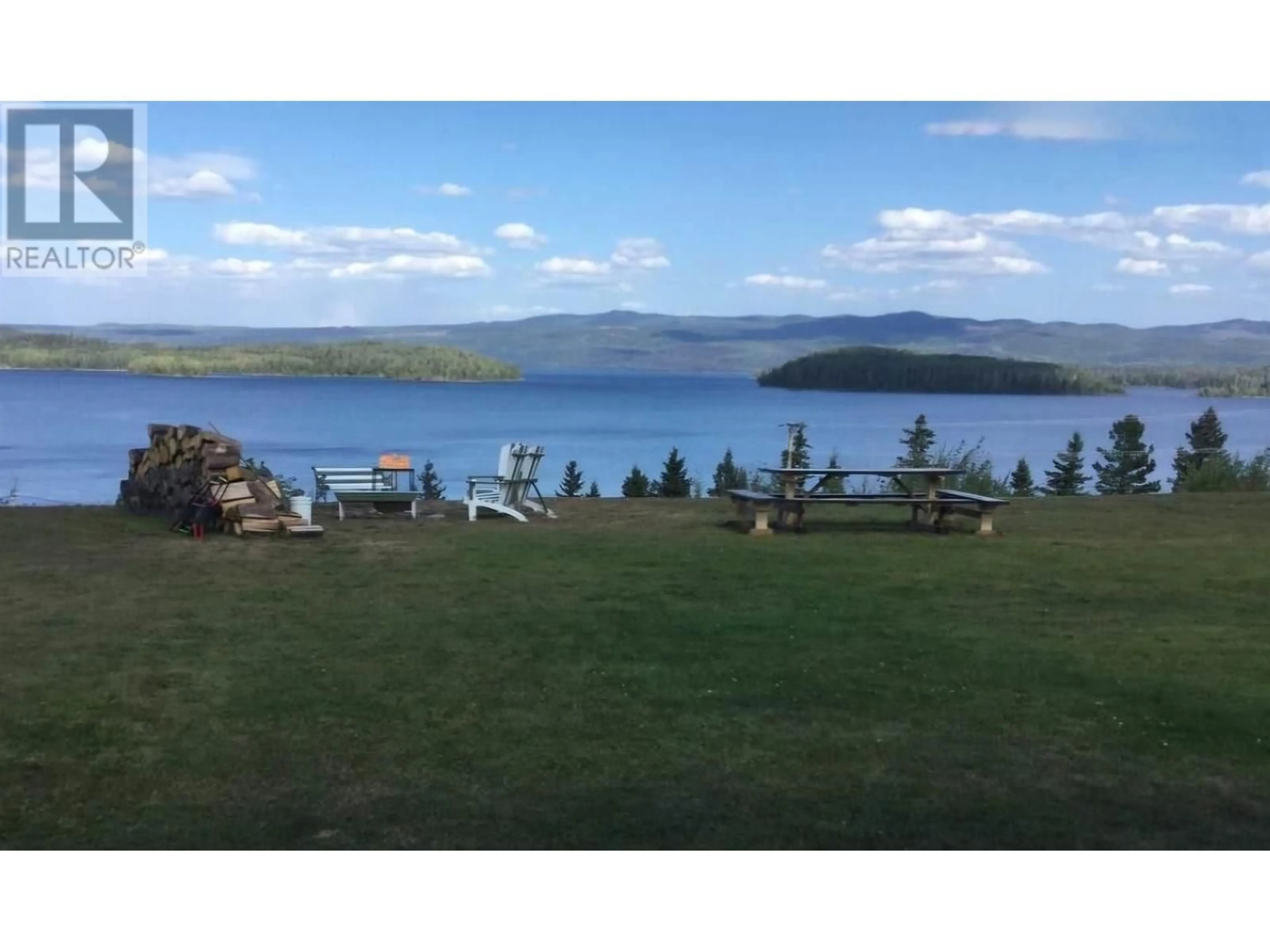 A pic from outside/outdoor area/front of a property/back of a property/a pic from drone, water/lake/river/ocean view for 27 - 50 HAGAN STREET, Granisle British Columbia V0J1W0