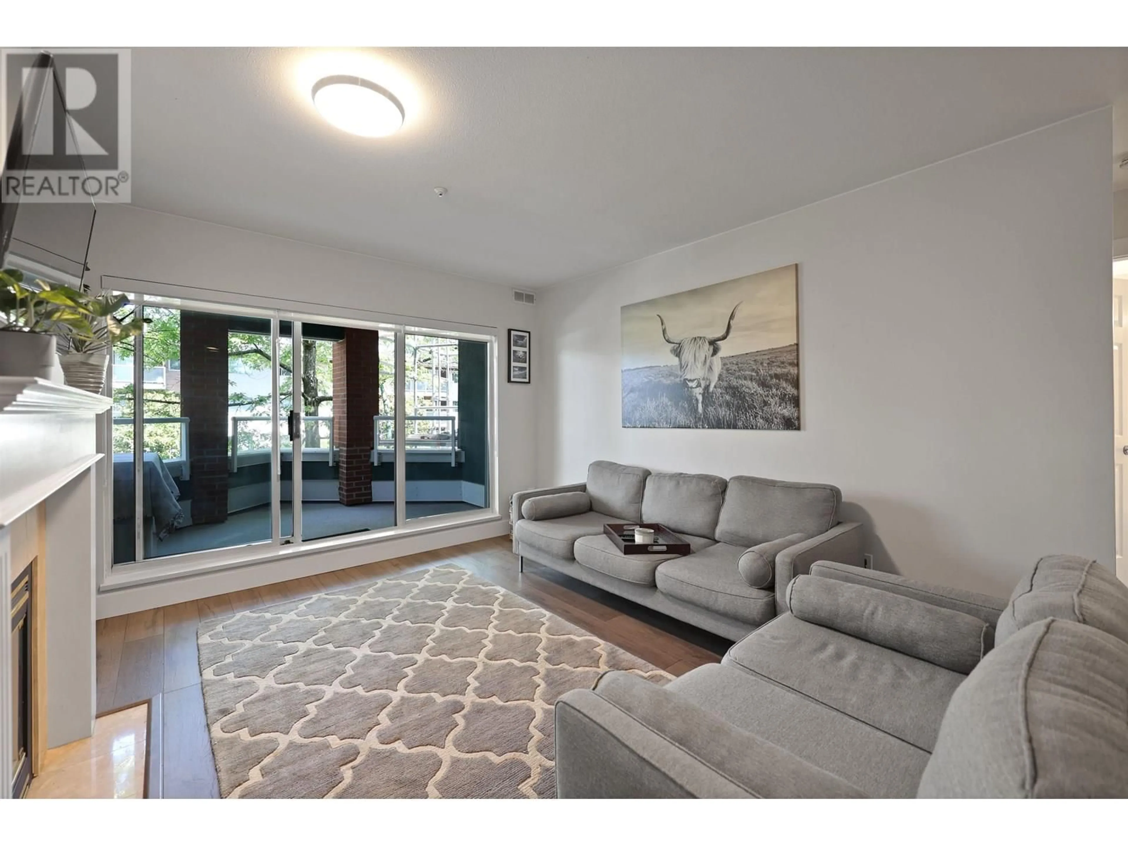 Living room with furniture, unknown for 306 - 128 8TH STREET, North Vancouver British Columbia V7M3M1