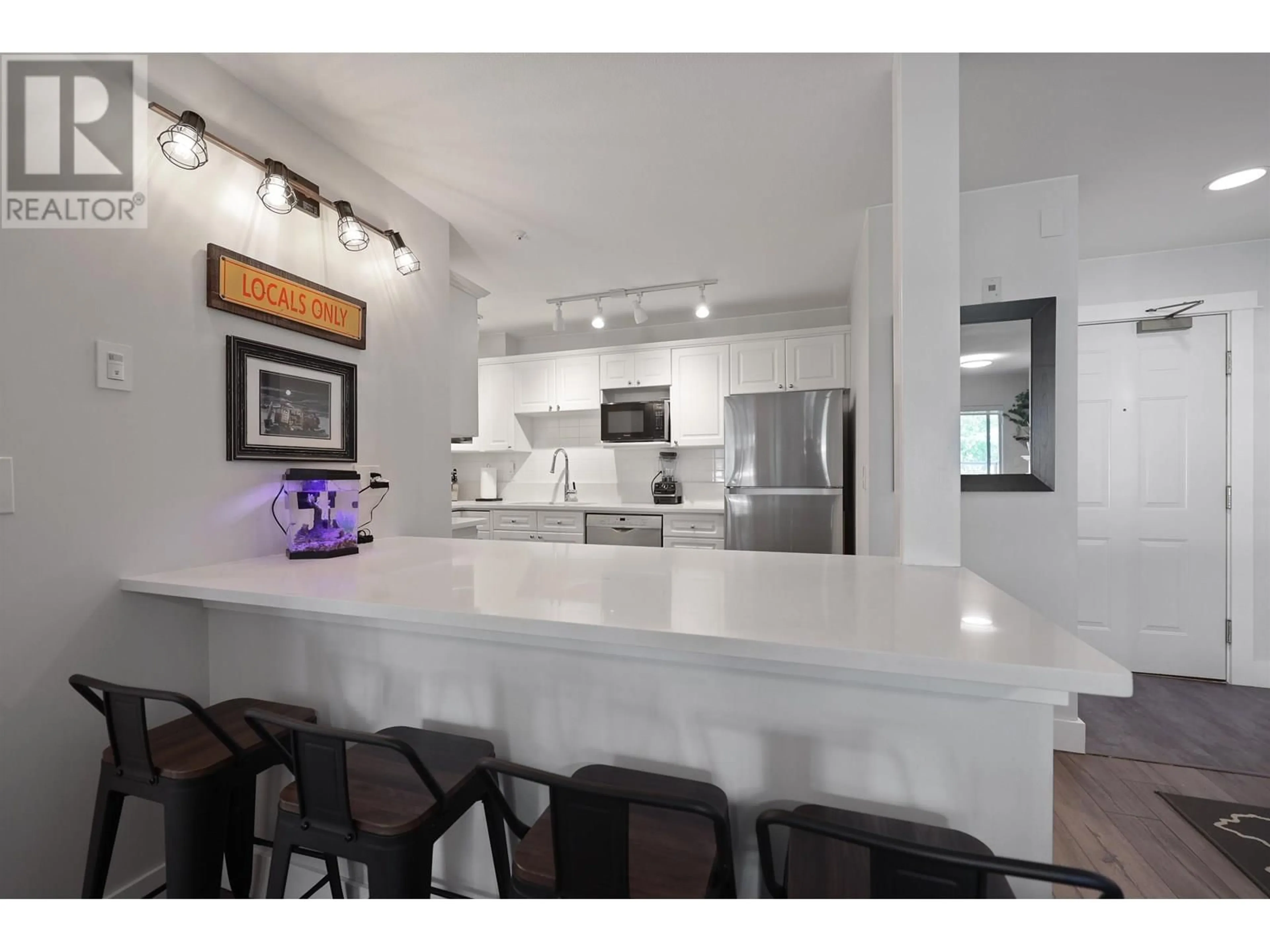 Open concept kitchen, ceramic/tile floor for 306 - 128 8TH STREET, North Vancouver British Columbia V7M3M1