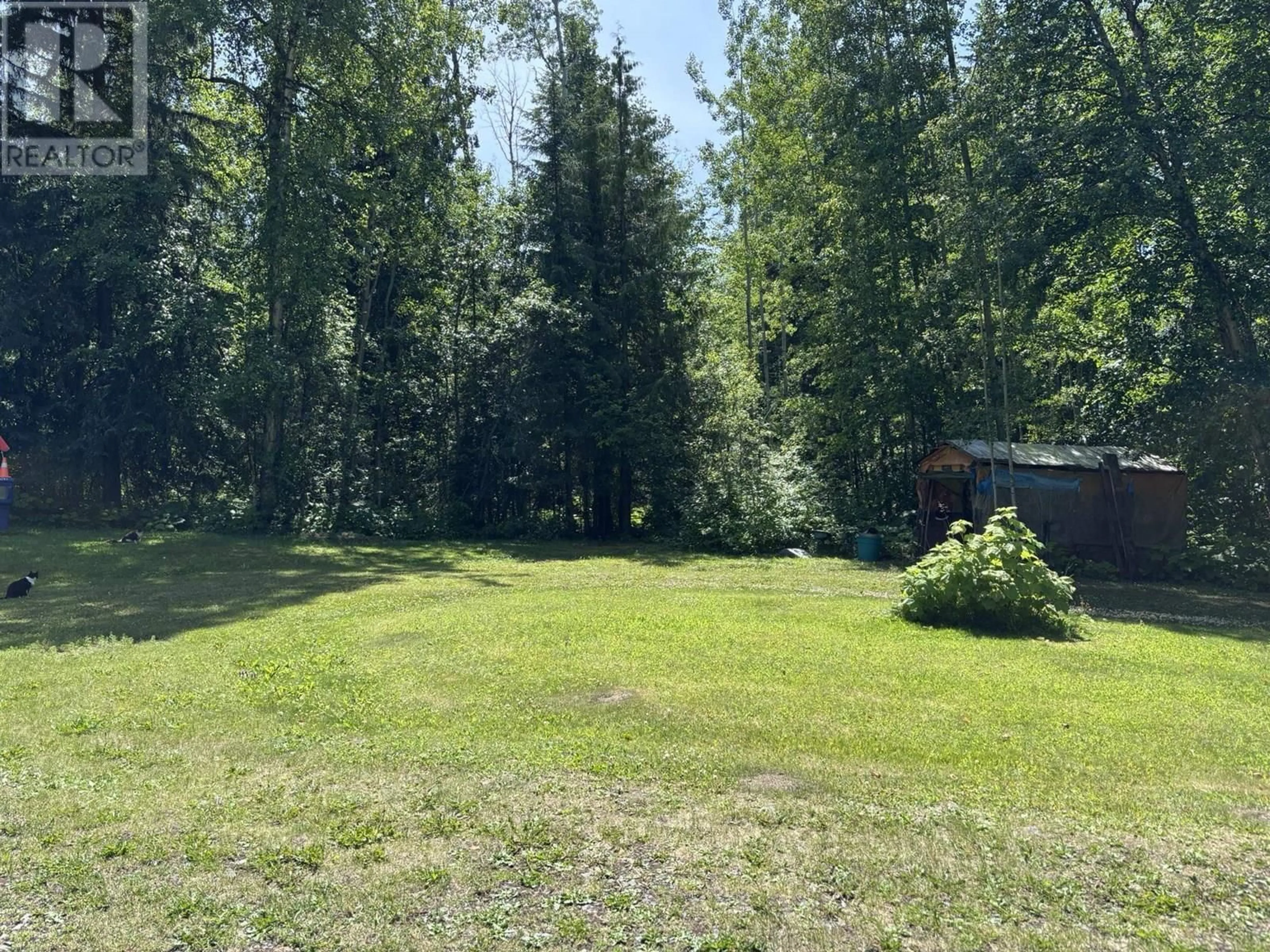 A pic from outside/outdoor area/front of a property/back of a property/a pic from drone, forest/trees view for 3936 FANSLAU ROAD, Quesnel British Columbia V2J6V7