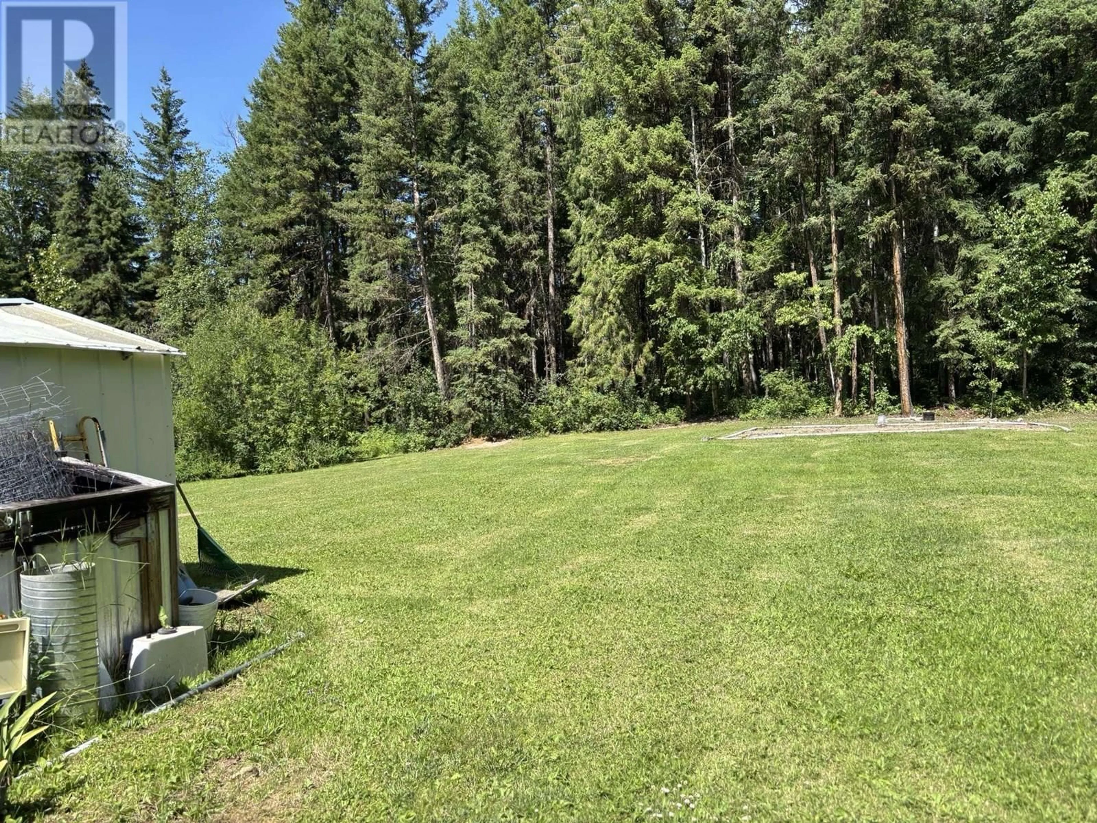 A pic from outside/outdoor area/front of a property/back of a property/a pic from drone, forest/trees view for 3936 FANSLAU ROAD, Quesnel British Columbia V2J6V7