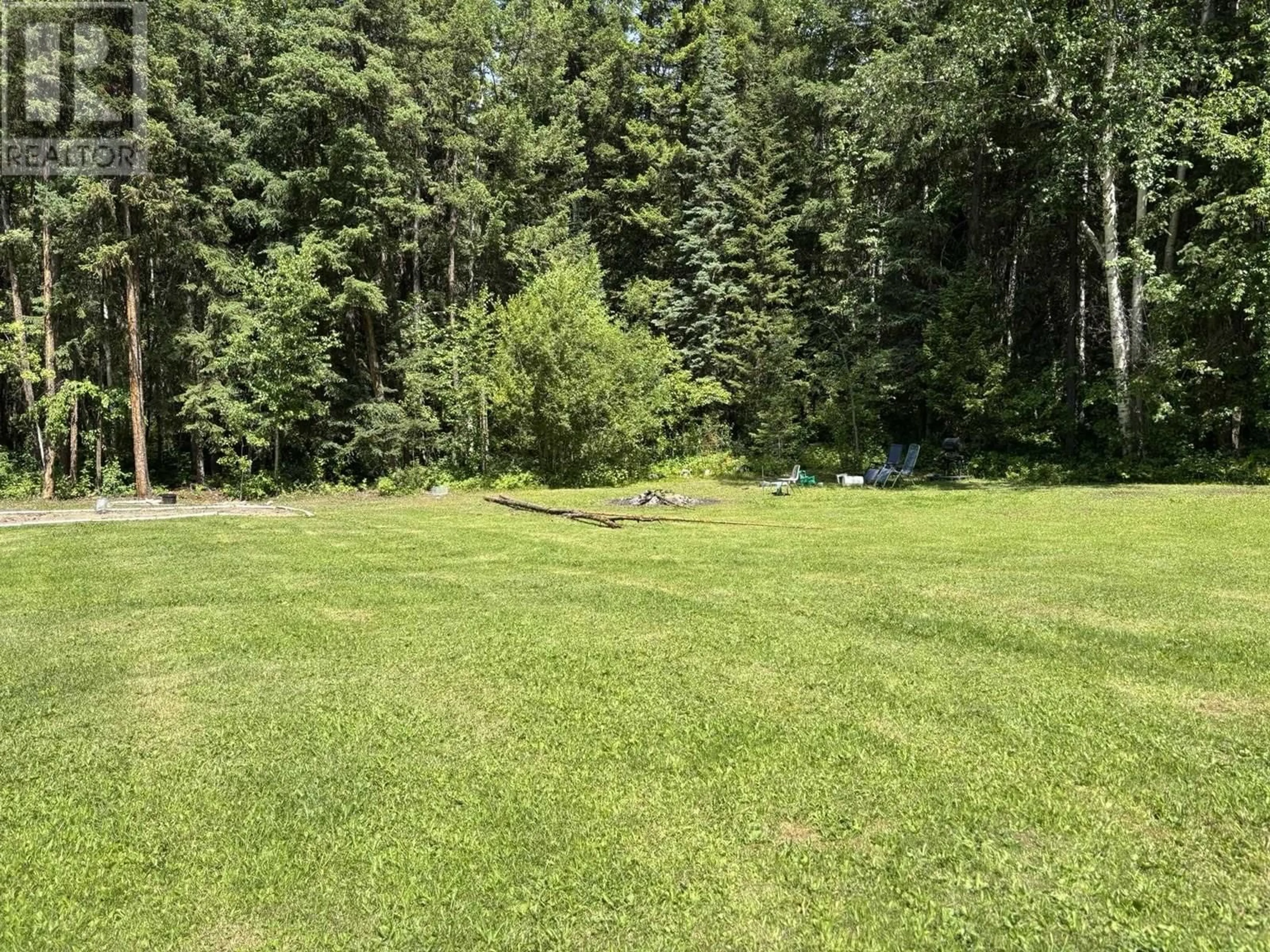 A pic from outside/outdoor area/front of a property/back of a property/a pic from drone, forest/trees view for 3936 FANSLAU ROAD, Quesnel British Columbia V2J6V7