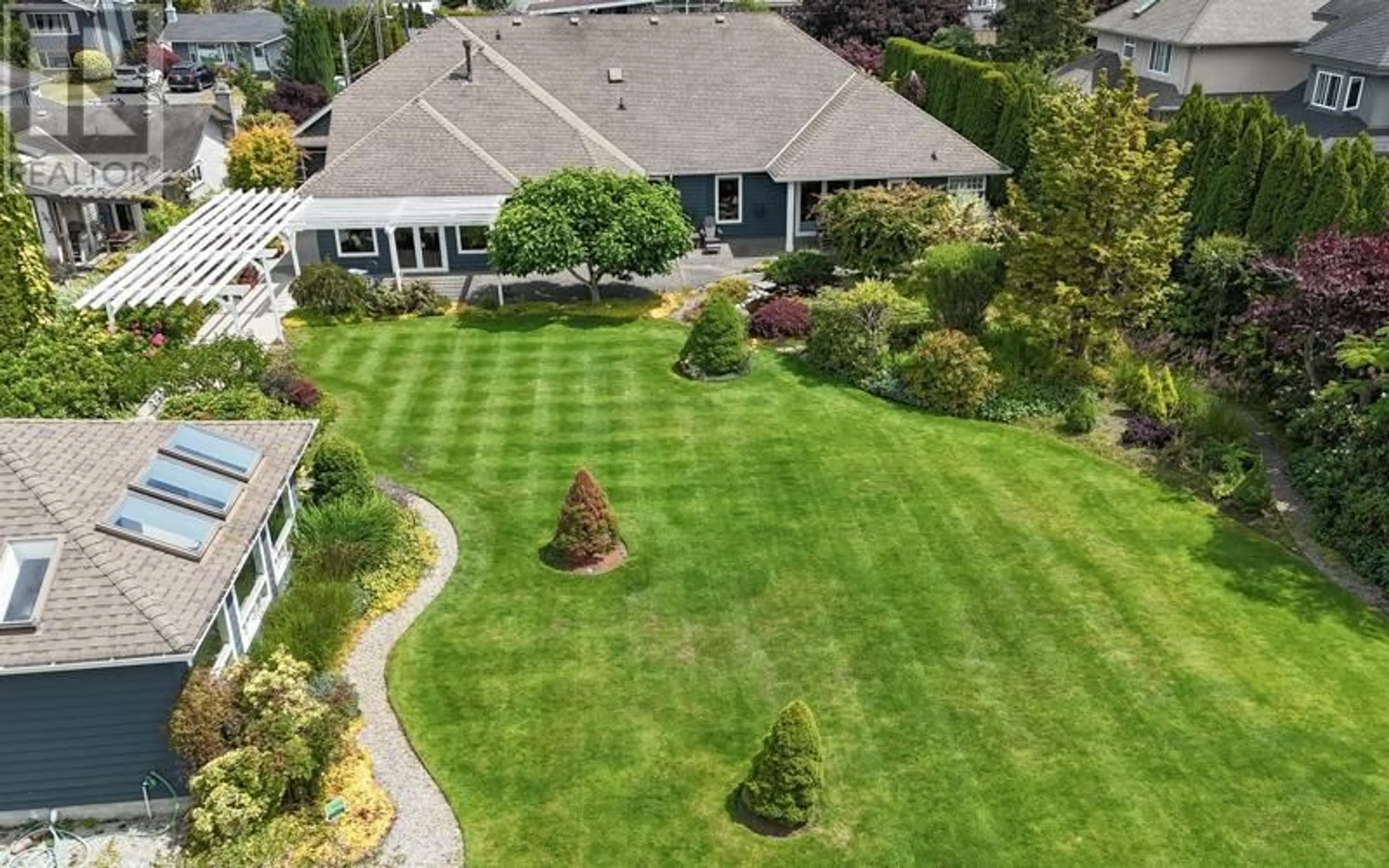 A pic from outside/outdoor area/front of a property/back of a property/a pic from drone, street for 4961 55B STREET, Delta British Columbia V4K3C2