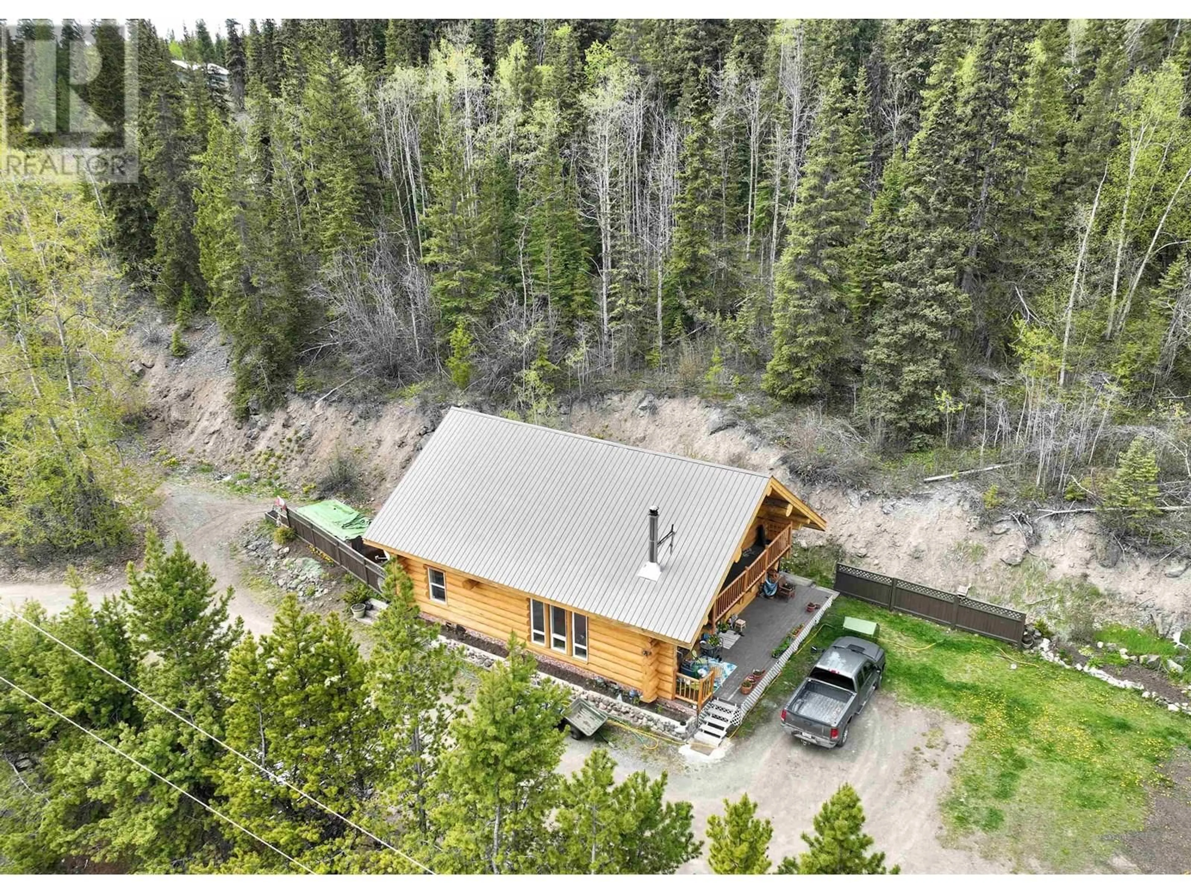 A pic from outside/outdoor area/front of a property/back of a property/a pic from drone, forest/trees view for 17025 BC-35 HIGHWAY, Burns Lake British Columbia V0J1E2