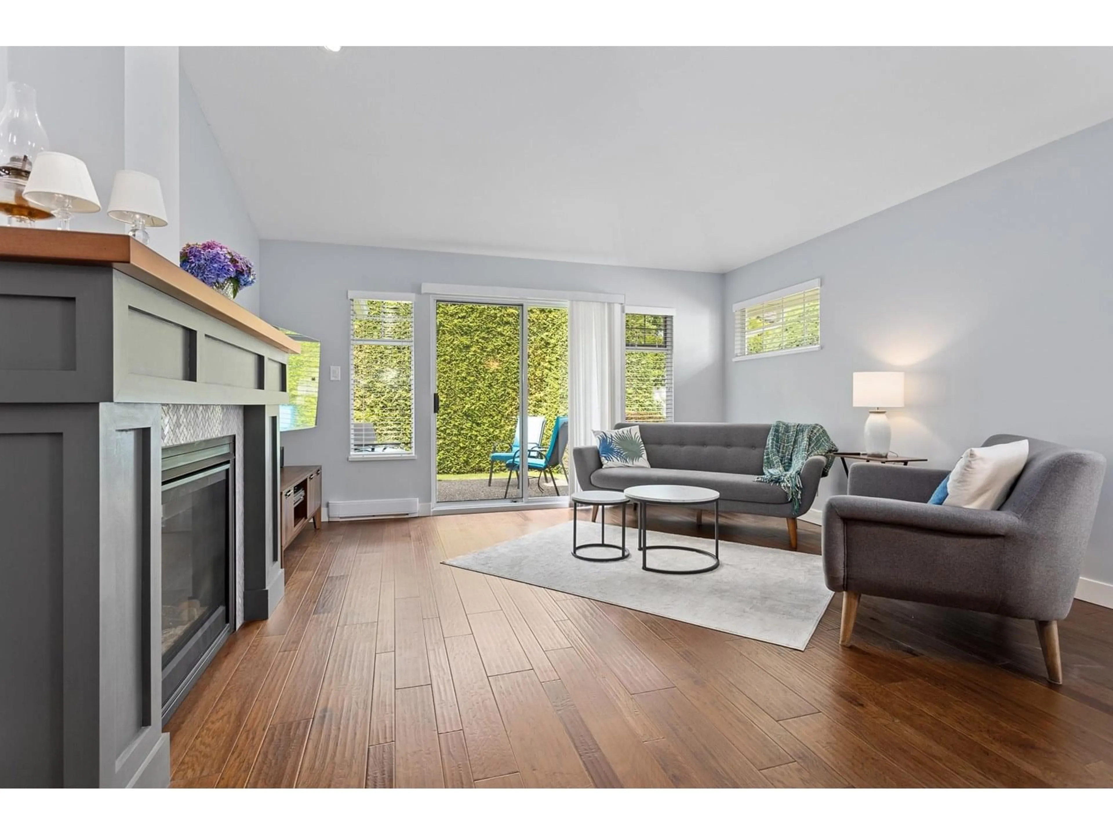 Living room with furniture, wood/laminate floor for 149 - 8737 212, Langley British Columbia V1M2C8