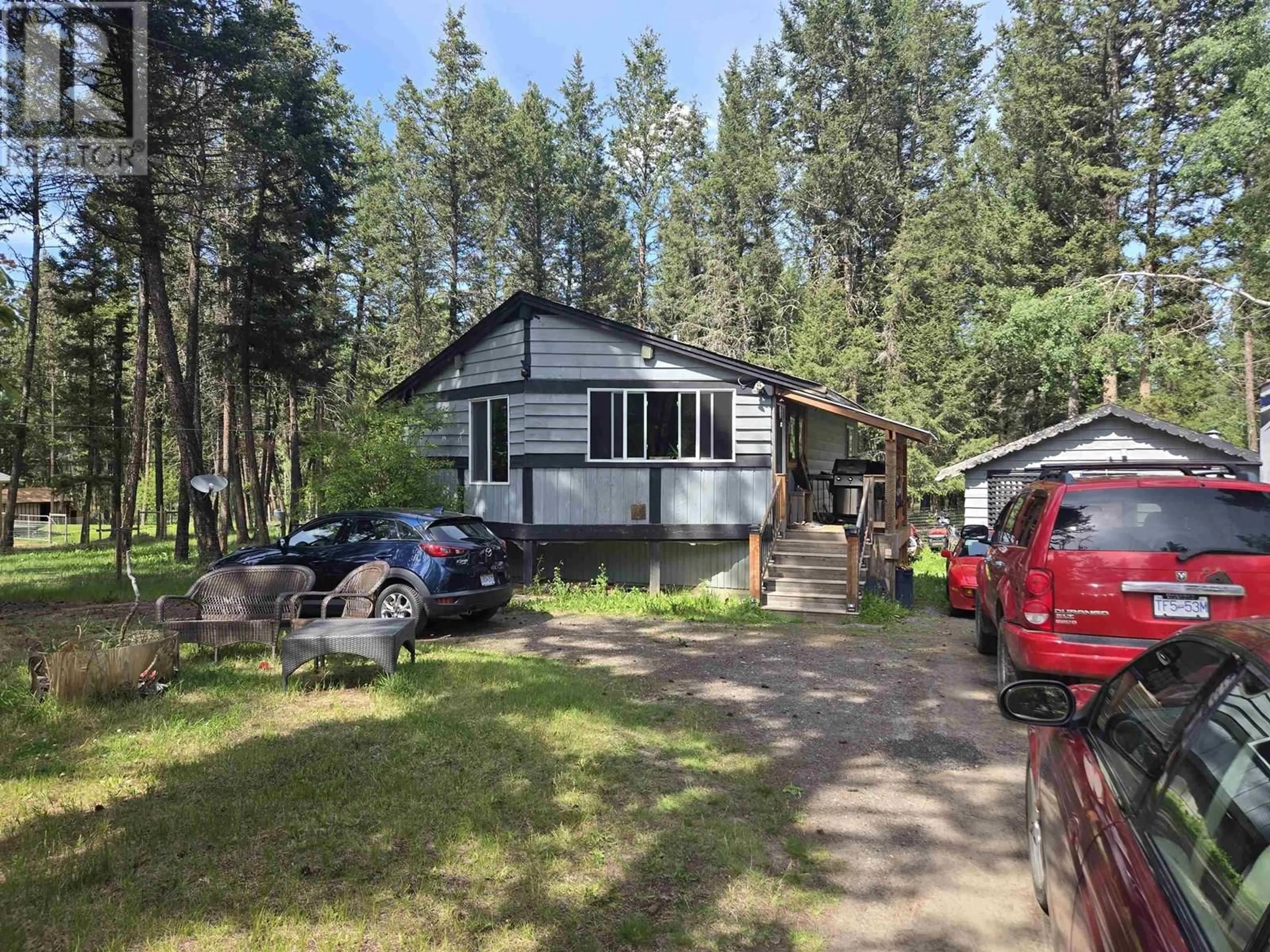 A pic from outside/outdoor area/front of a property/back of a property/a pic from drone, unknown for 4987 SMITH ROAD, 108 Mile Ranch British Columbia V0K2Z0