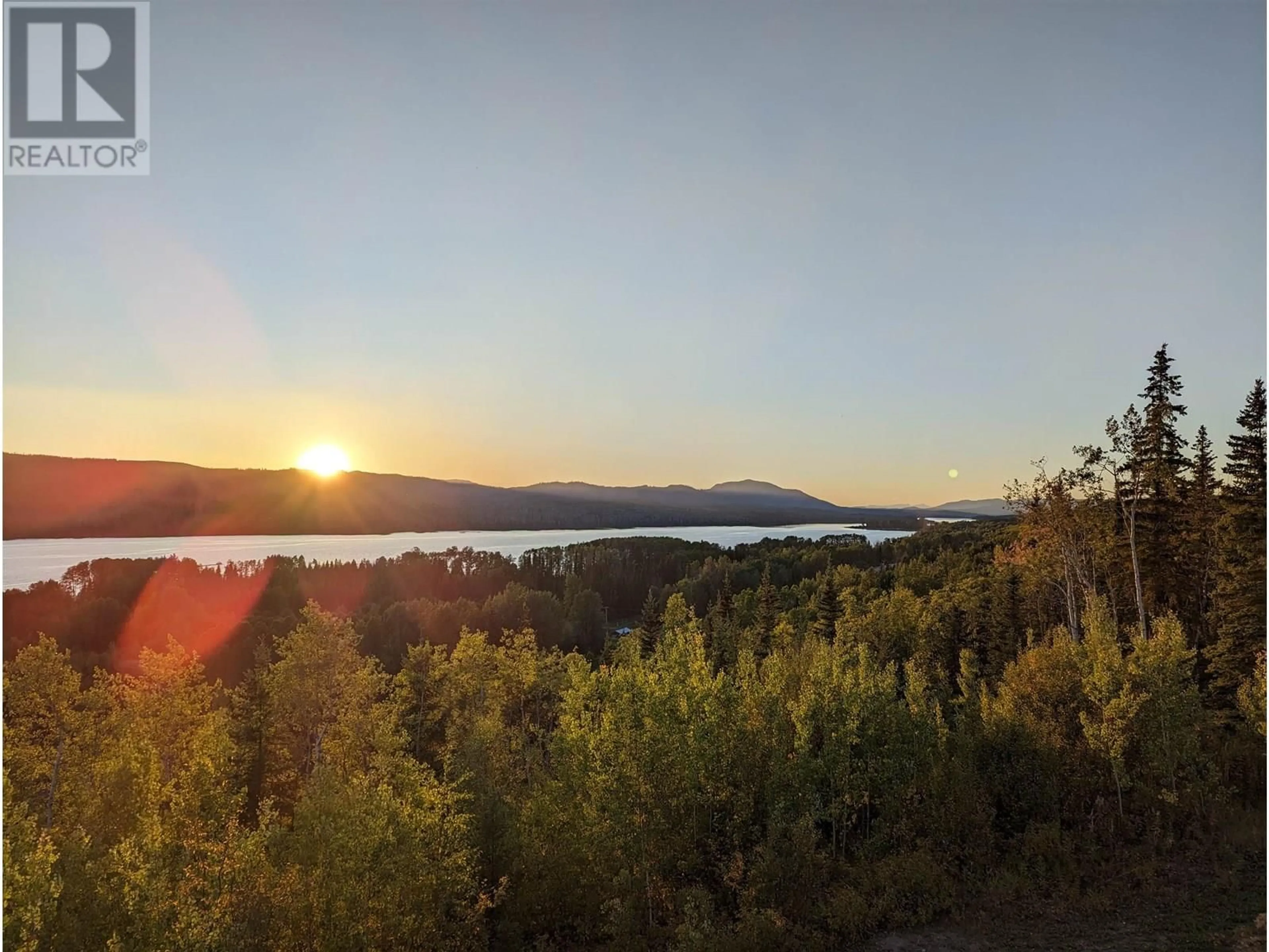 A pic from outside/outdoor area/front of a property/back of a property/a pic from drone, water/lake/river/ocean view for 3615 MURPHY ROAD, Burns Lake British Columbia V0J1E1