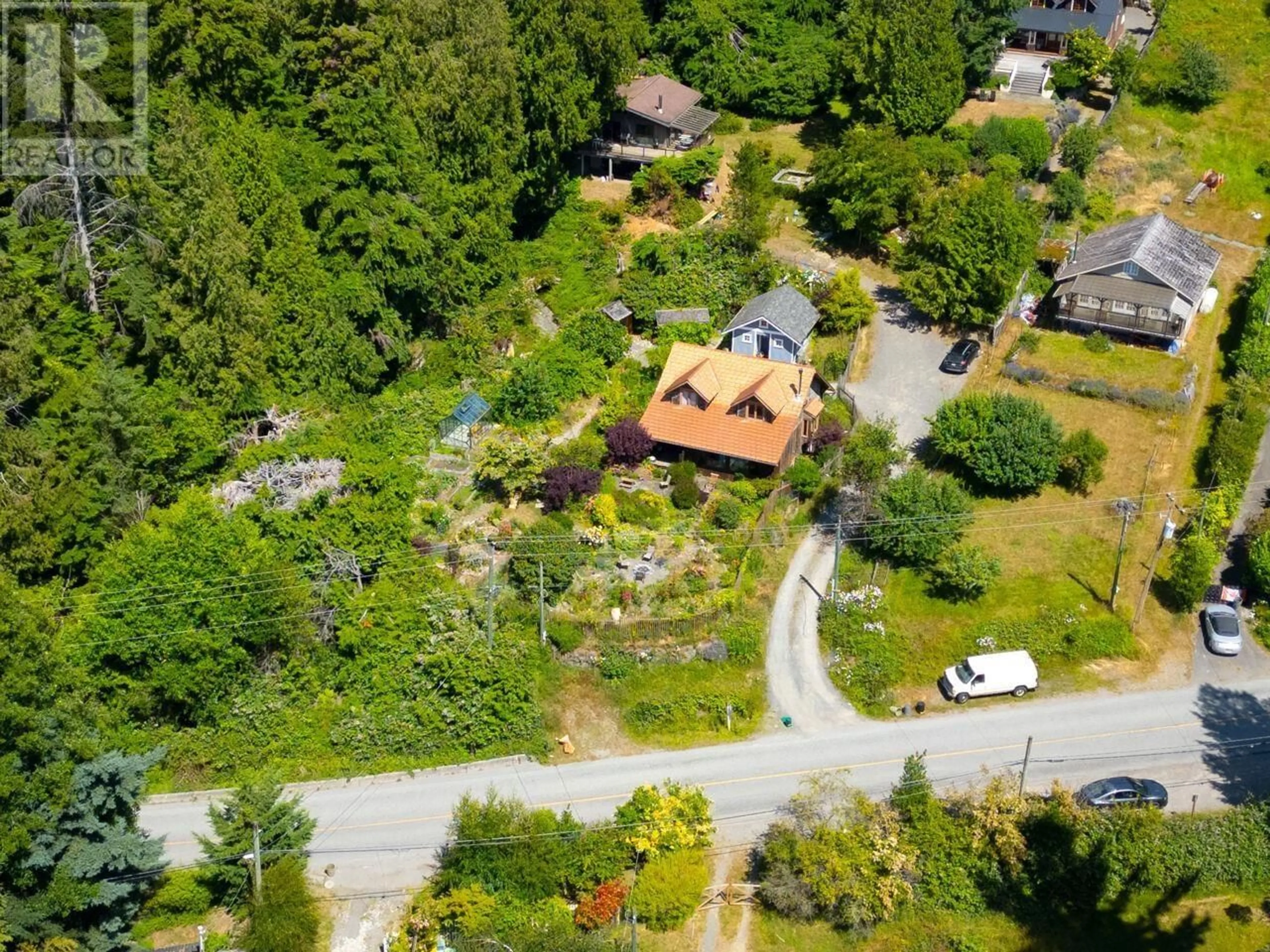 A pic from outside/outdoor area/front of a property/back of a property/a pic from drone, street for 1743 BOWEN BAY ROAD, Bowen Island British Columbia V0N1G2
