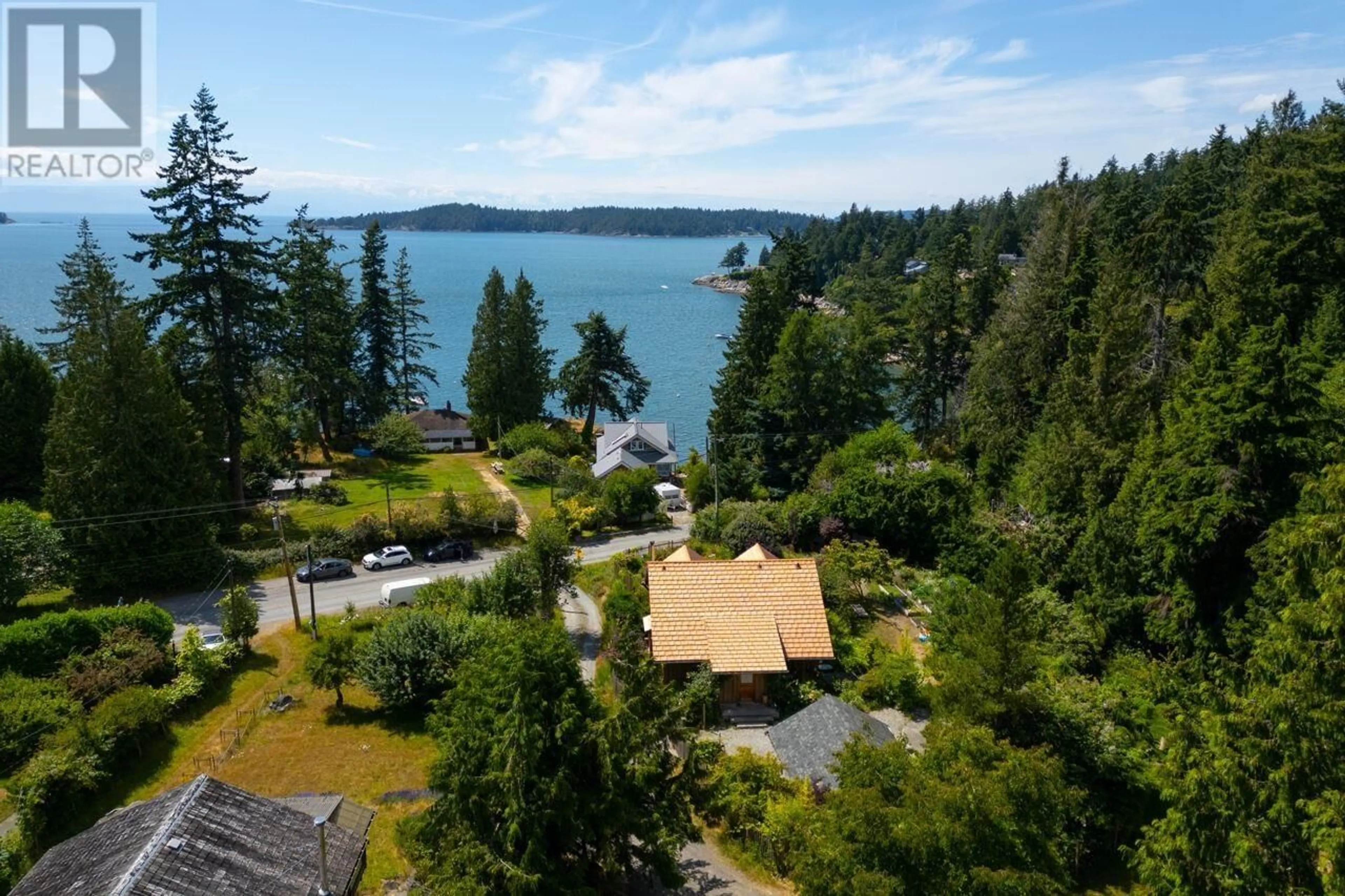 A pic from outside/outdoor area/front of a property/back of a property/a pic from drone, water/lake/river/ocean view for 1743 BOWEN BAY ROAD, Bowen Island British Columbia V0N1G2