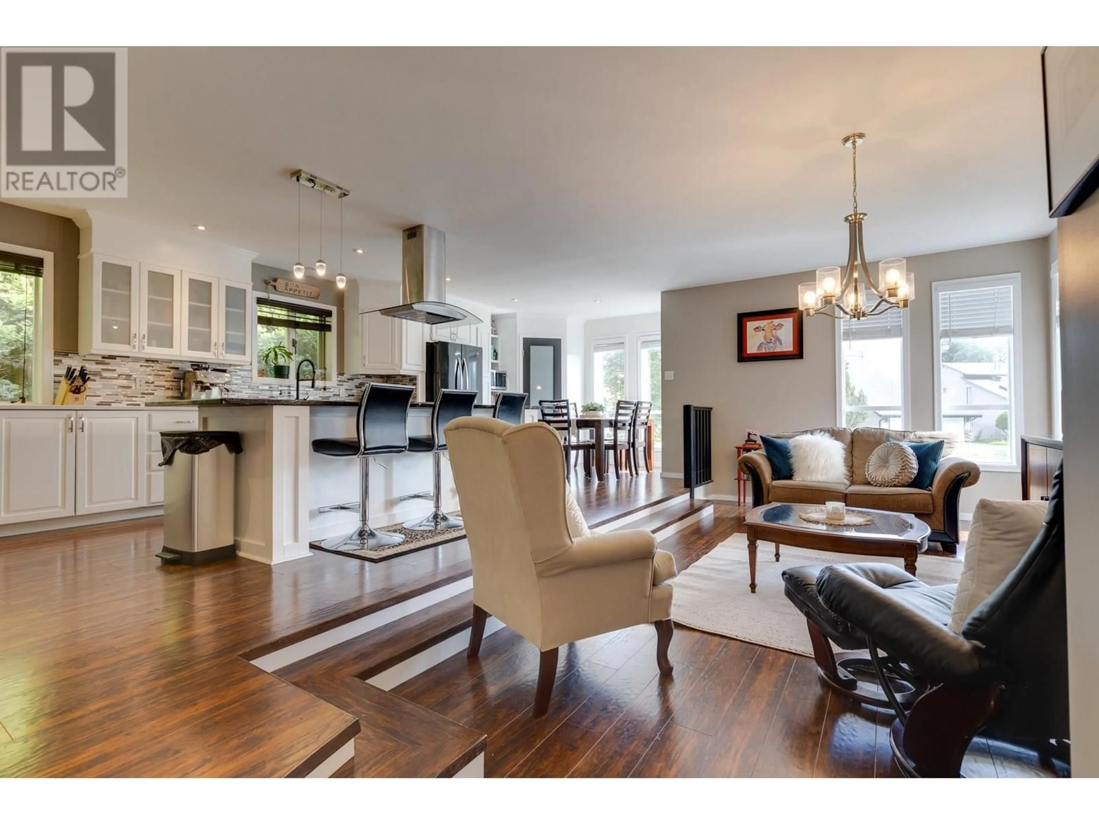 Open concept kitchen, wood/laminate floor for 1561 PAXTON PLACE, Prince George British Columbia V2L5K3