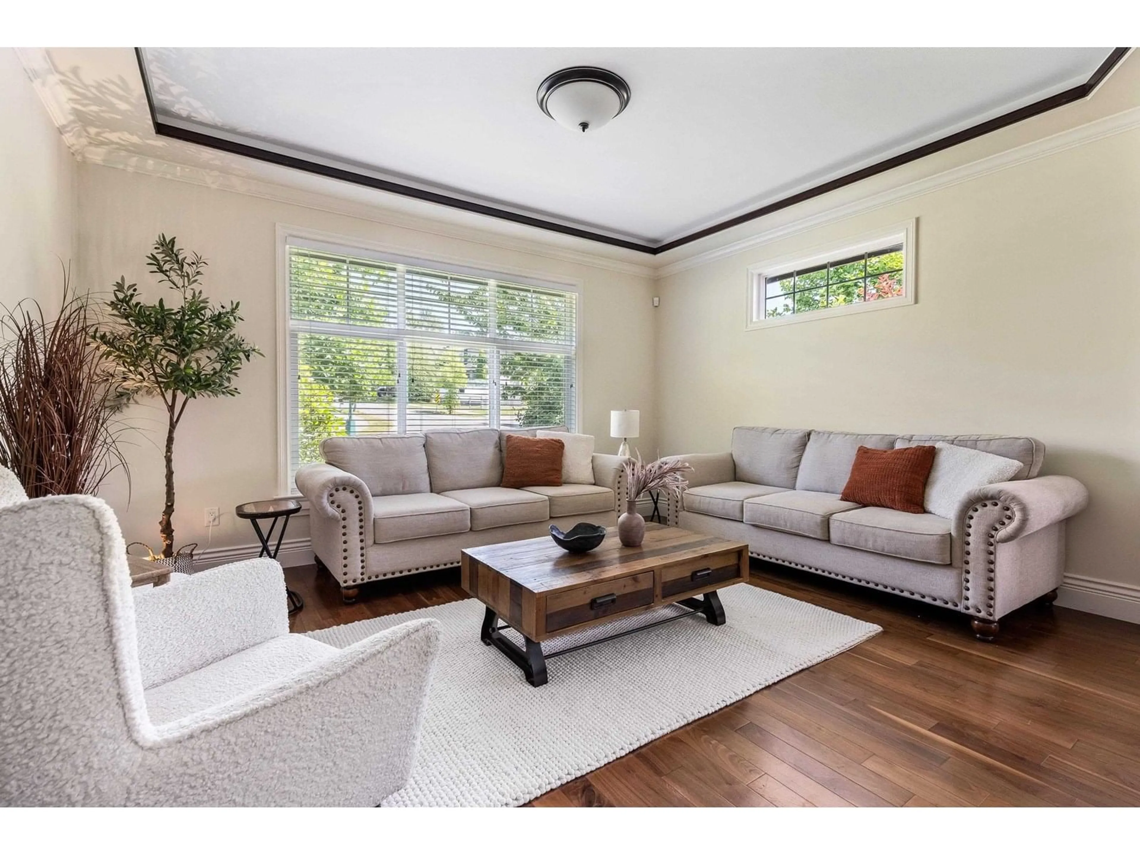 Living room with furniture, wood/laminate floor for 3837 KALEIGH, Abbotsford British Columbia V3G3E3