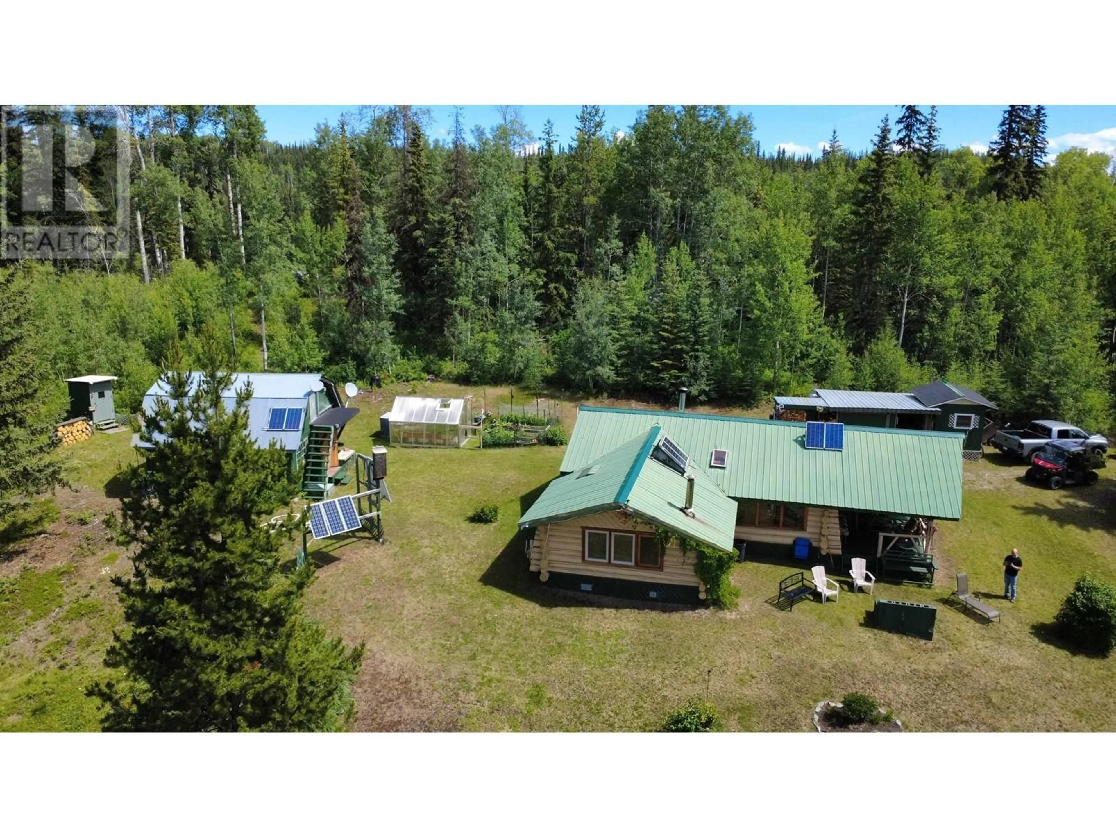 A pic from outside/outdoor area/front of a property/back of a property/a pic from drone, forest/trees view for 4428 TITETOWN ROAD, Quesnel British Columbia V2J3H9
