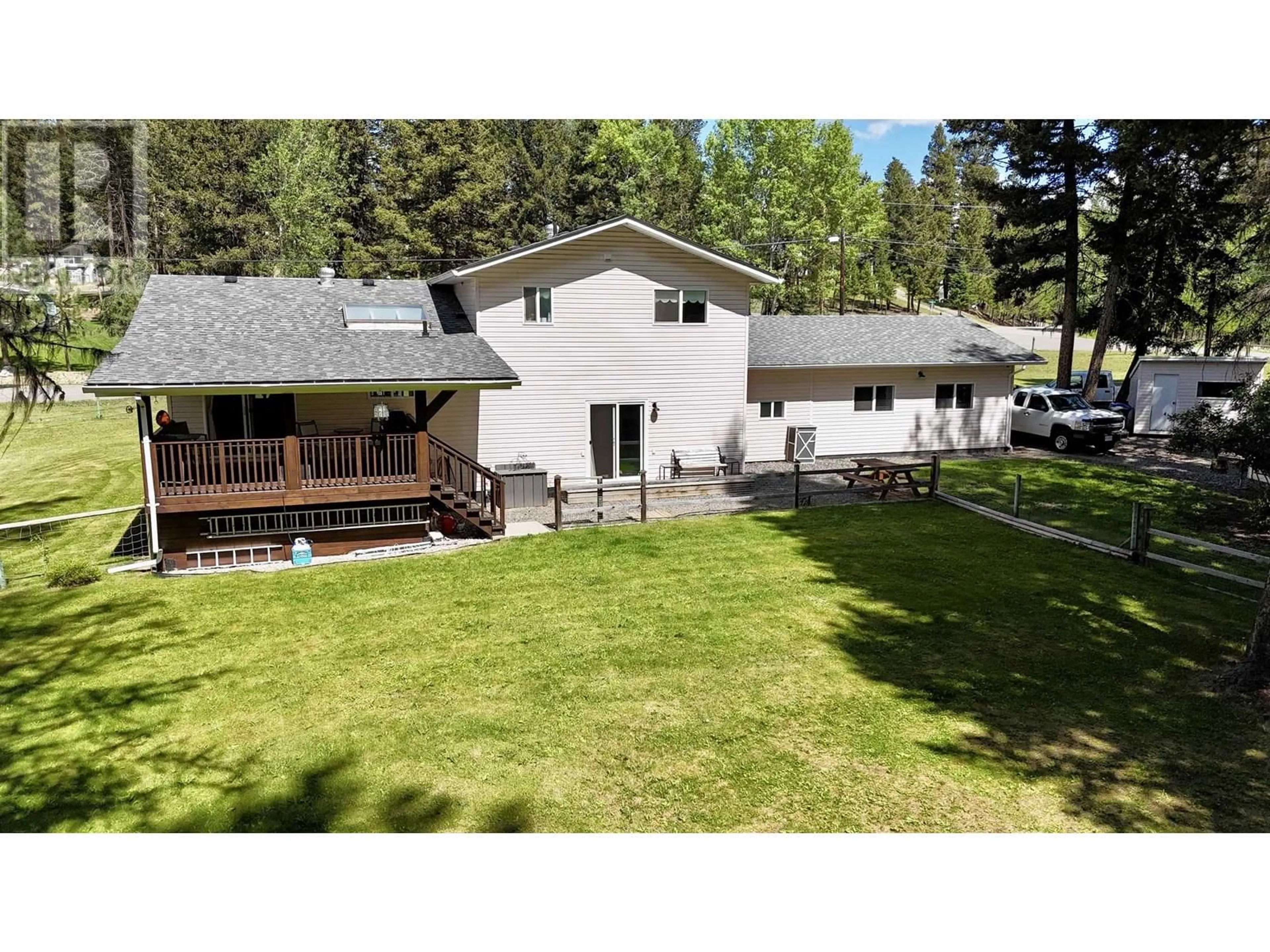 A pic from outside/outdoor area/front of a property/back of a property/a pic from drone, unknown for 4887 MEESQUONO TRAIL, 108 Mile Ranch British Columbia V0K2Z0