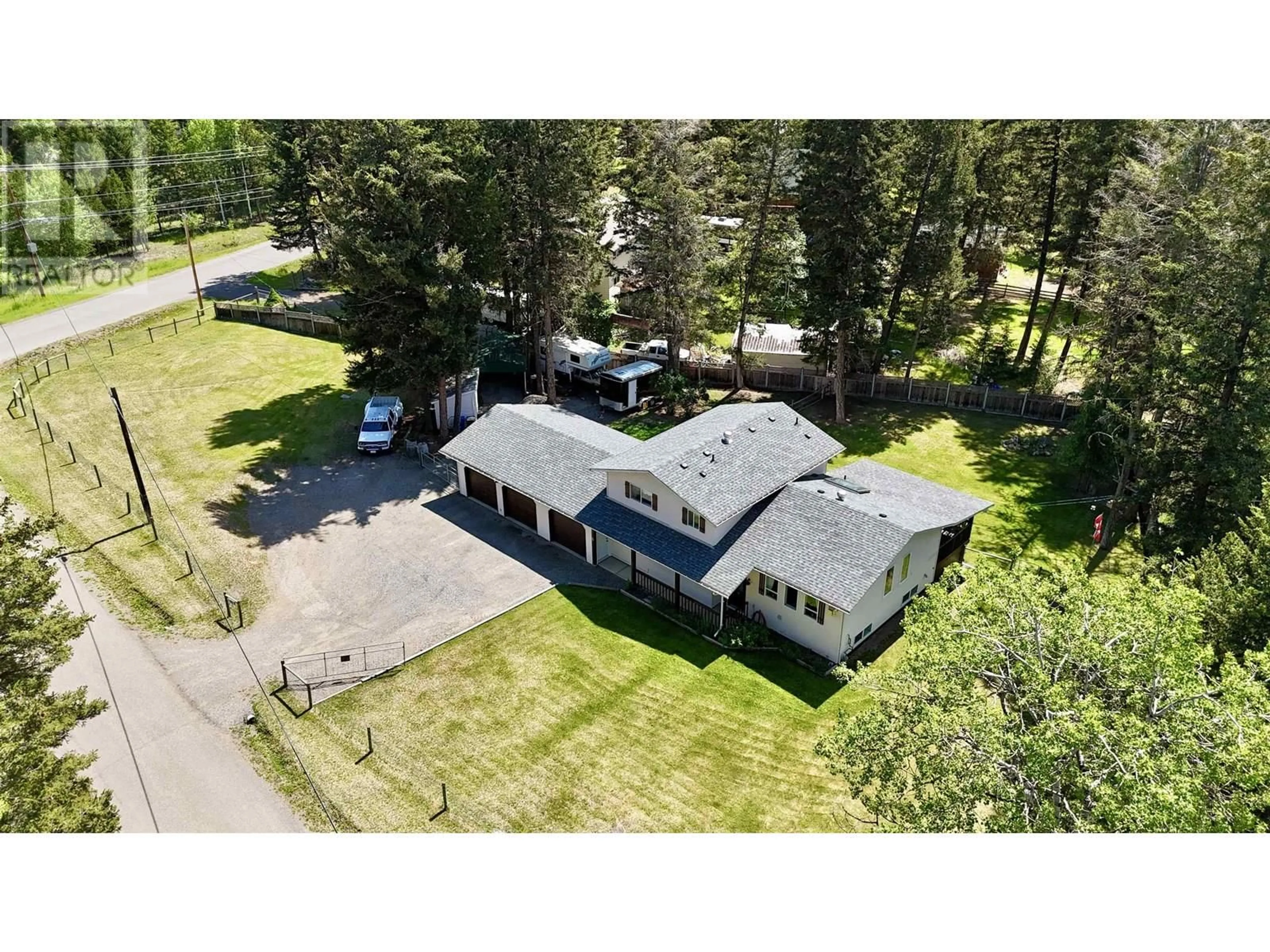 A pic from outside/outdoor area/front of a property/back of a property/a pic from drone, unknown for 4887 MEESQUONO TRAIL, 108 Mile Ranch British Columbia V0K2Z0