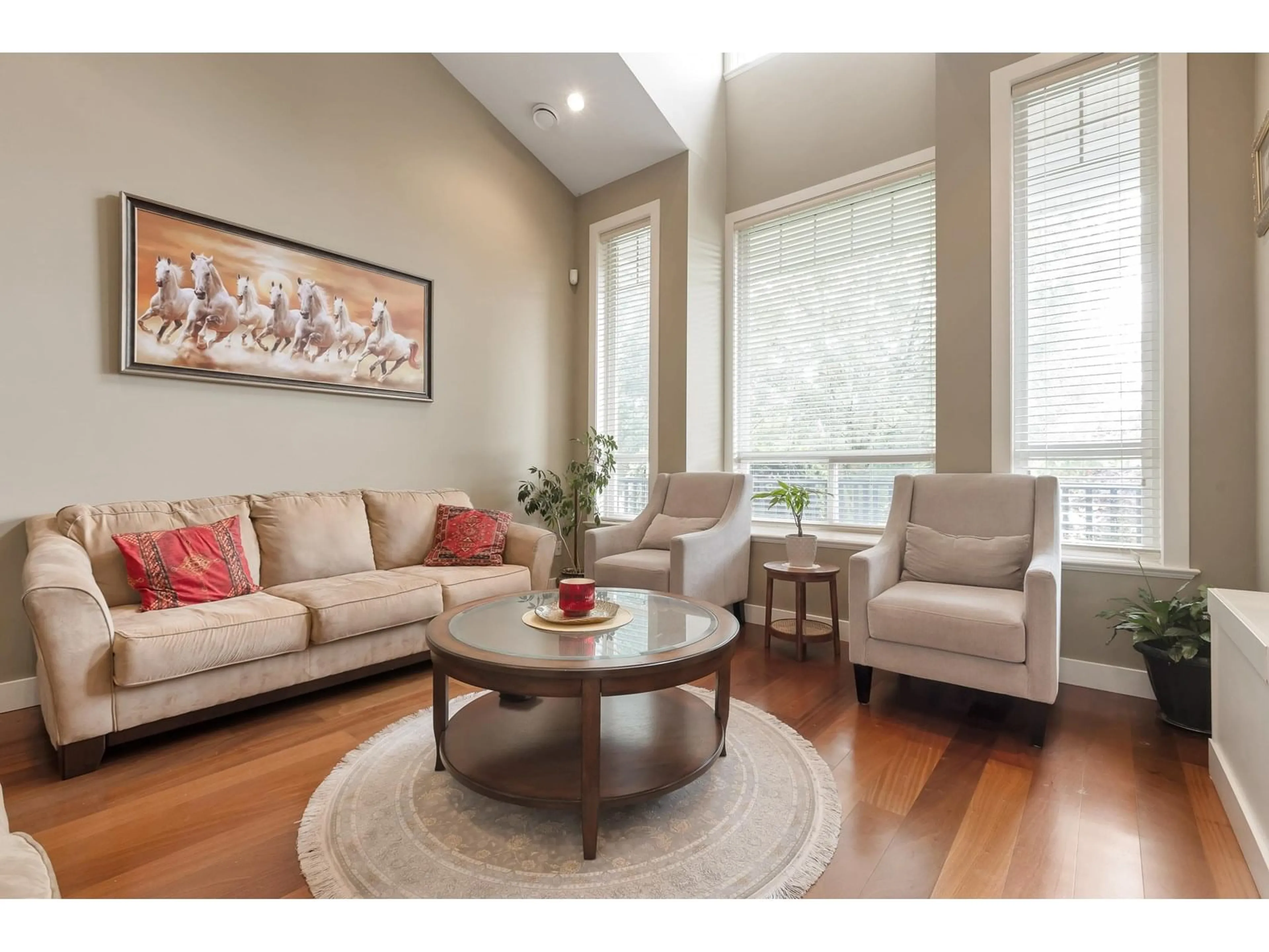 Living room with furniture, wood/laminate floor for 14777 57, Surrey British Columbia V3S2W1