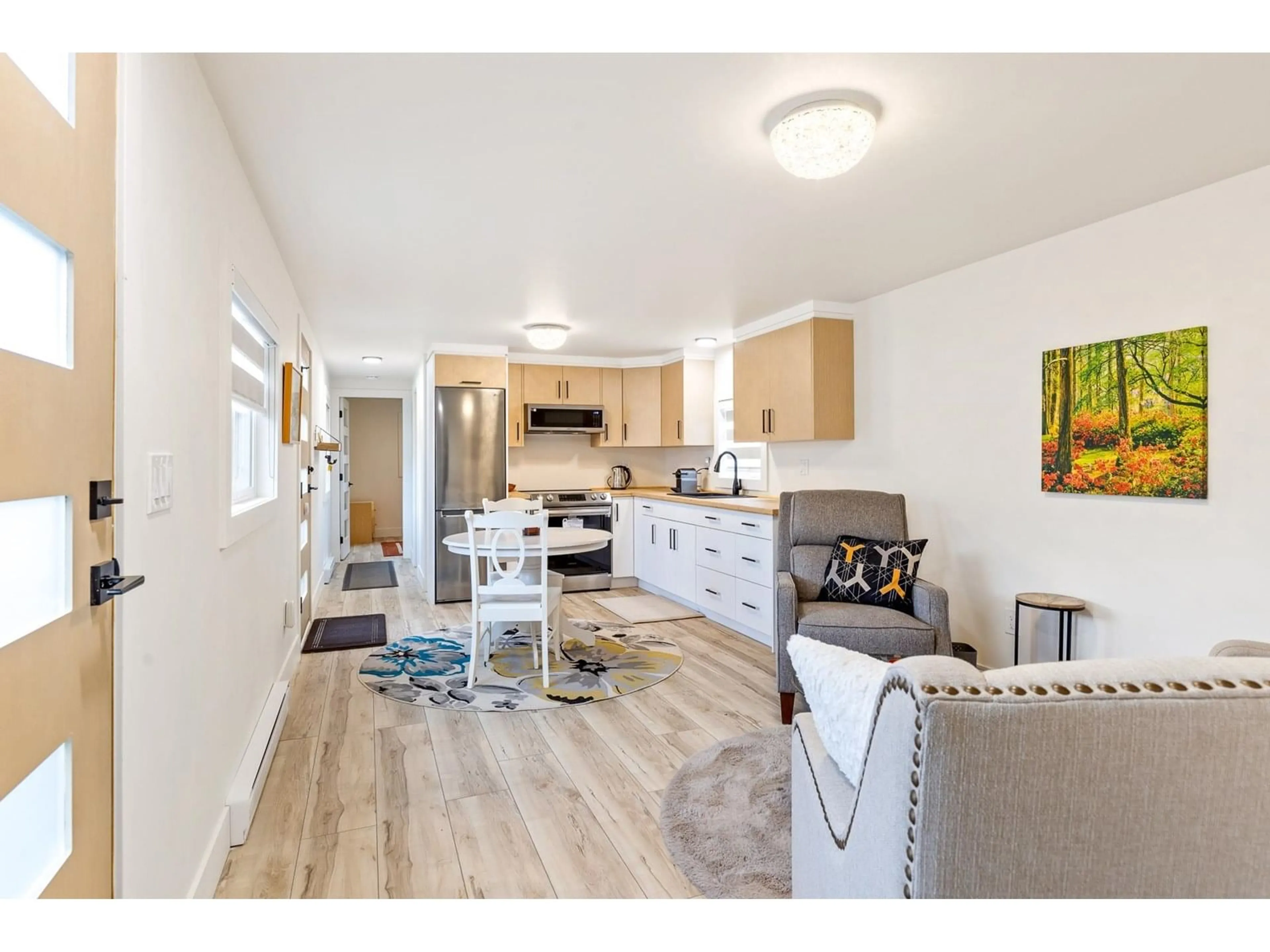 Open concept kitchen, wood/laminate floor for 7 - 8953 SHOOK, Mission British Columbia V2V5M2