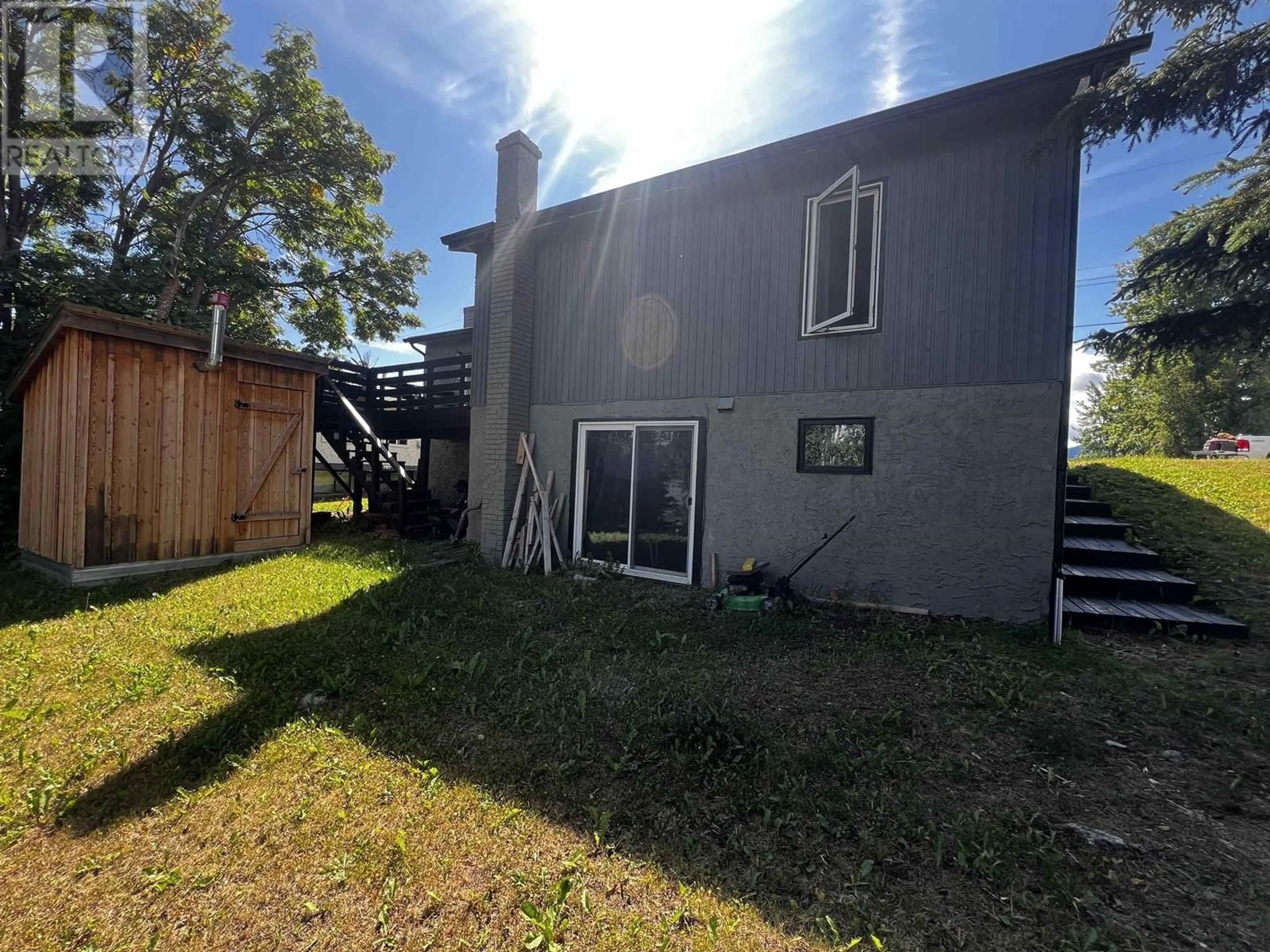 A pic from outside/outdoor area/front of a property/back of a property/a pic from drone, building for 137 TUNASA CRESCENT, Fraser Lake British Columbia V0J1S0