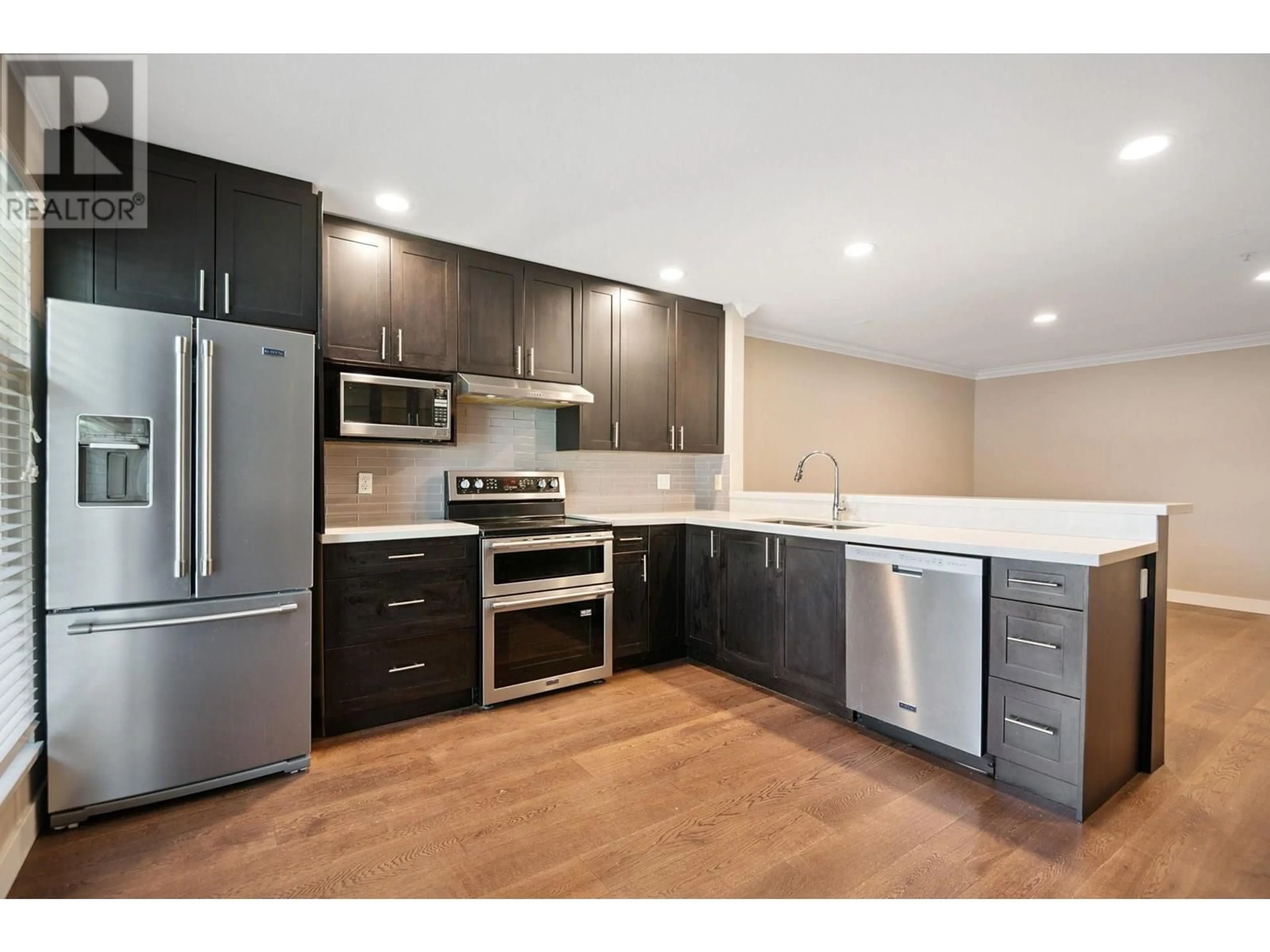Open concept kitchen, wood/laminate floor for 97 - 758 RIVERSIDE DRIVE, Port Coquitlam British Columbia V3B7V8
